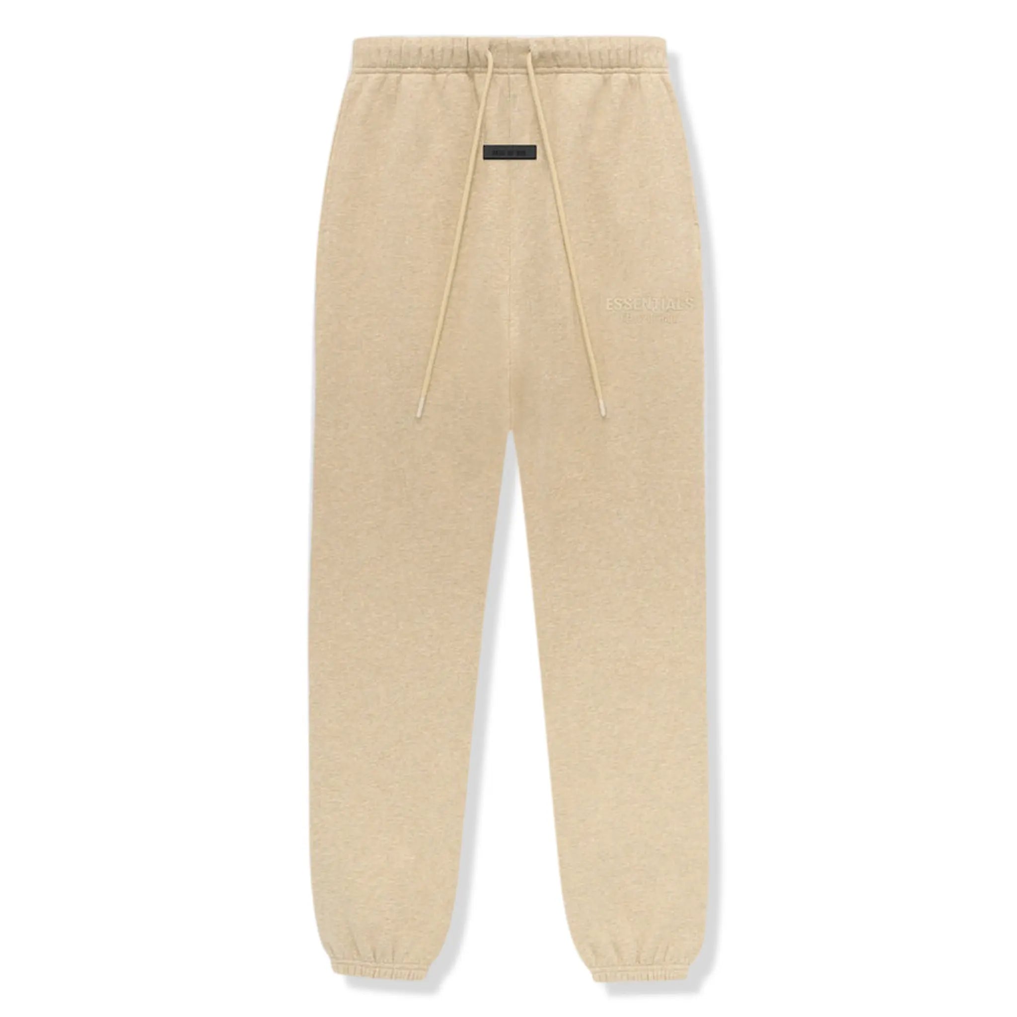 Front view of Fear Of God Essentials Gold Heather Sweatpants (FW23)