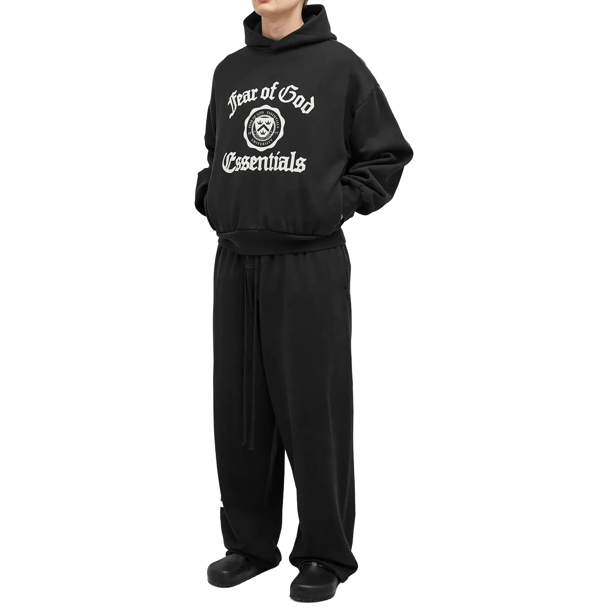 Front Side View of Fear Of God Essentials Heavy Fleece Vintage Shrunken Black Hoodie (FW24) 192HO246210F