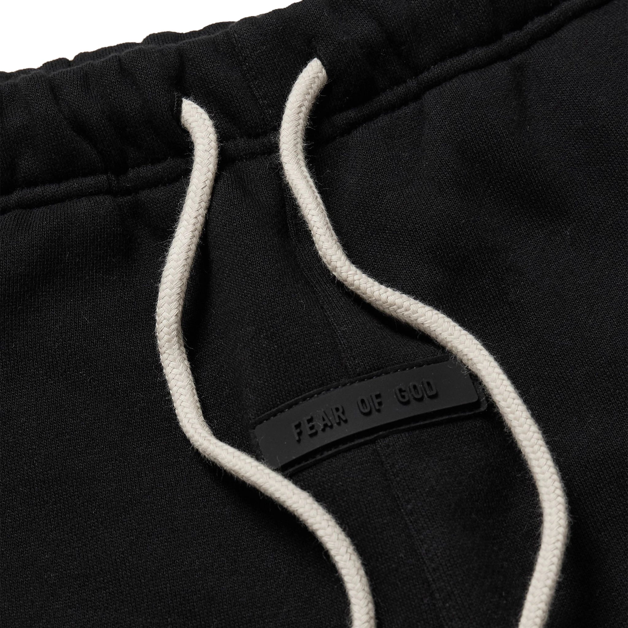 Front logo view of Fear Of God Essentials Jet Black Sweatpants