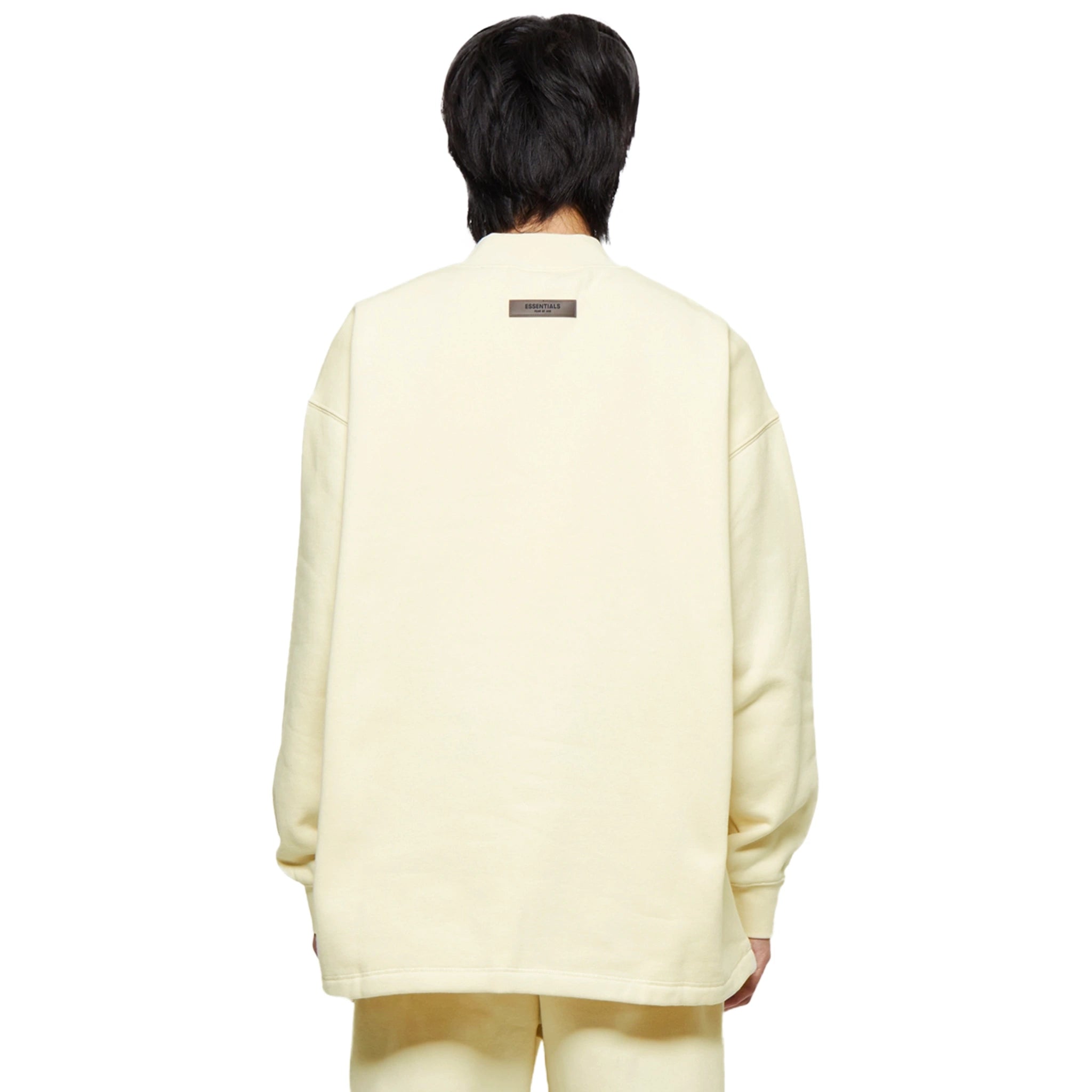 Model back view of Fear Of God Essentials Relaxed Egg Shell Crewneck