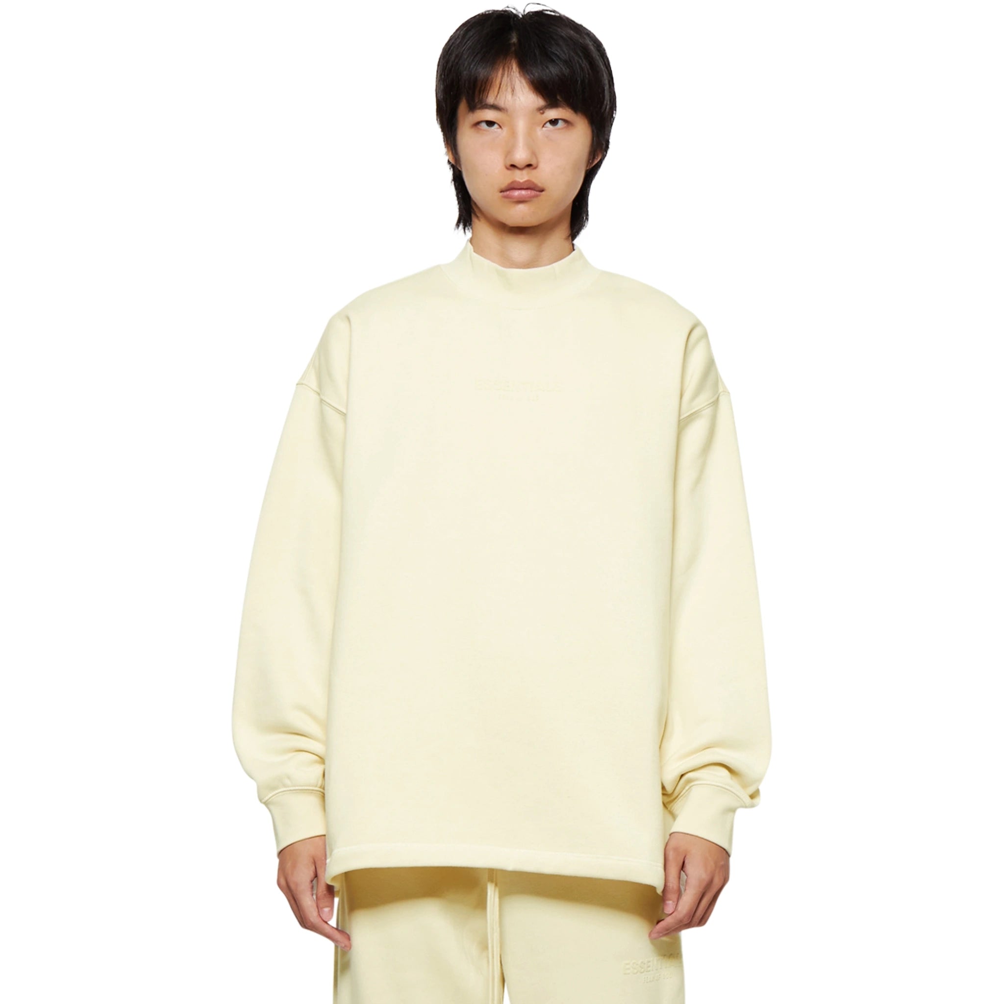 Model front view of Fear Of God Essentials Relaxed Egg Shell Crewneck