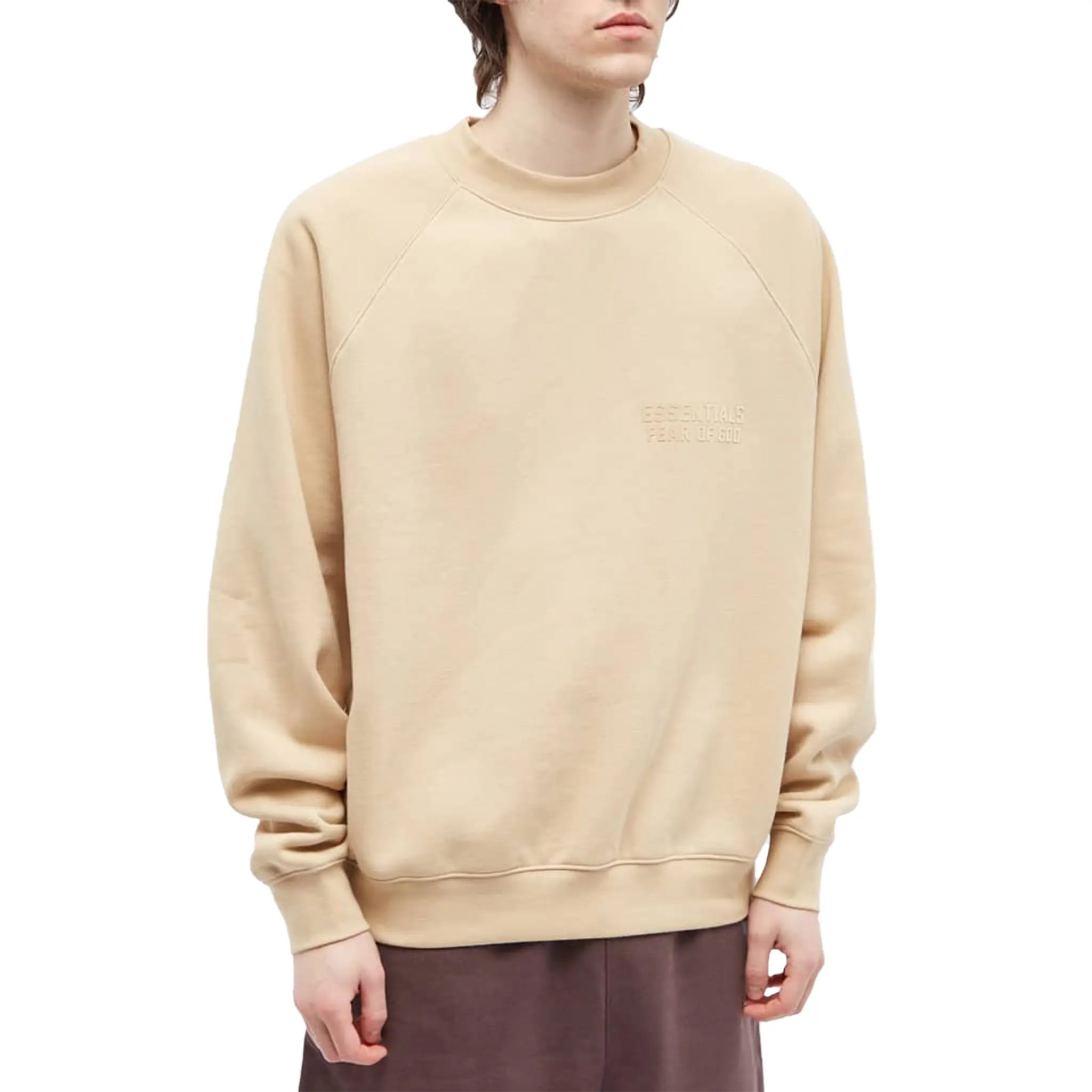 Model front view of Fear Of God Essentials Sand Sweatshirt (SS23)