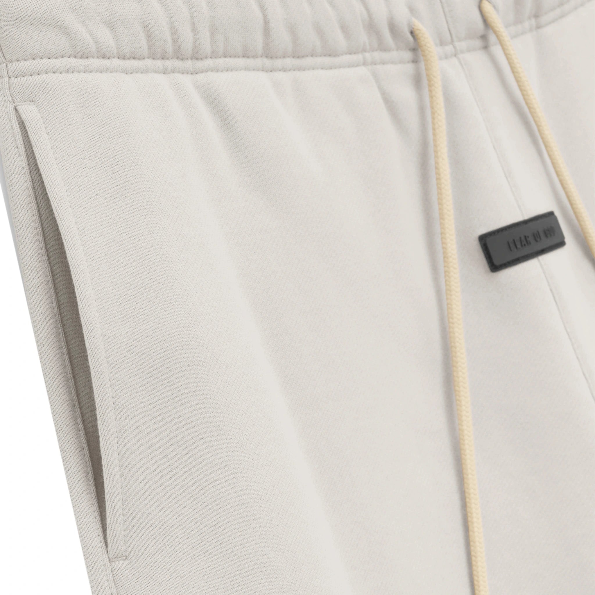 Detail view of Fear Of God Essentials Silver Cloud Sweatpants (FW23)