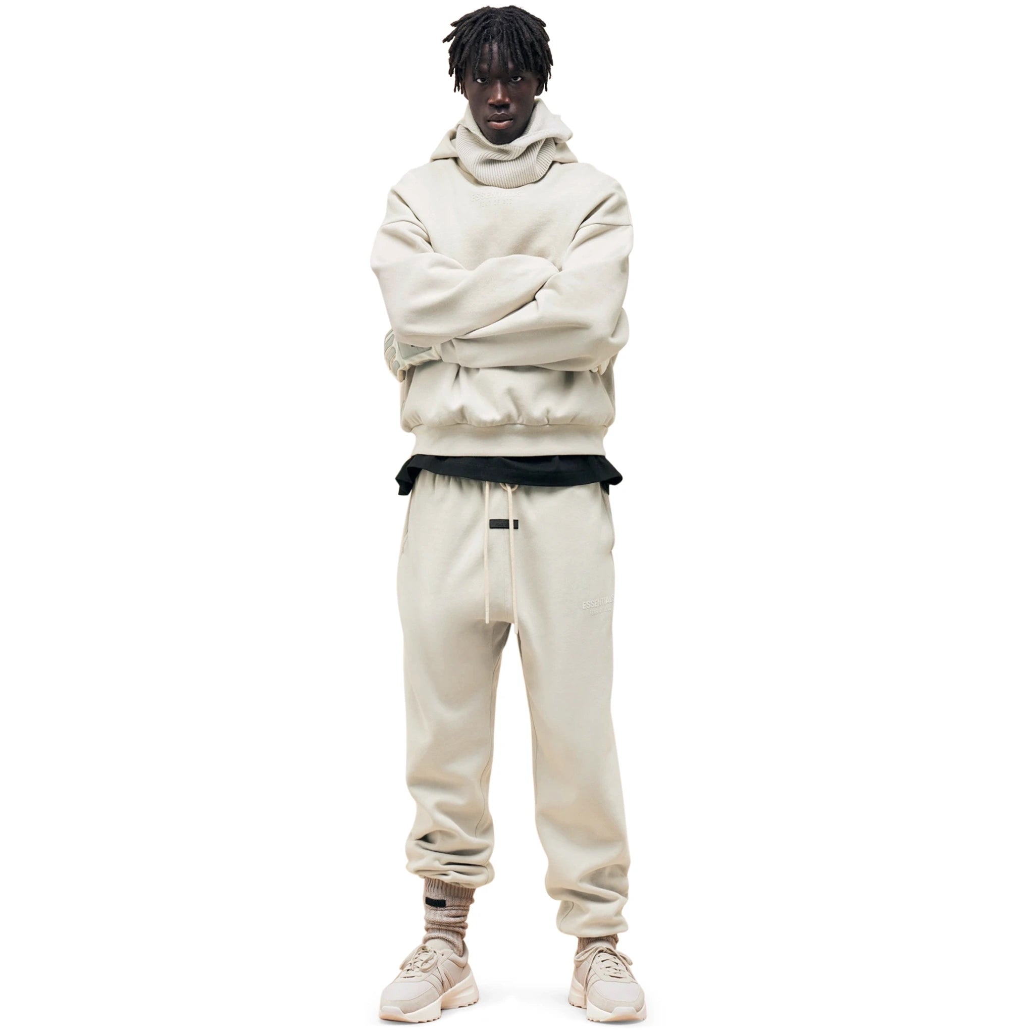 Model front view of Fear Of God Essentials Silver Cloud Sweatpants (FW23)