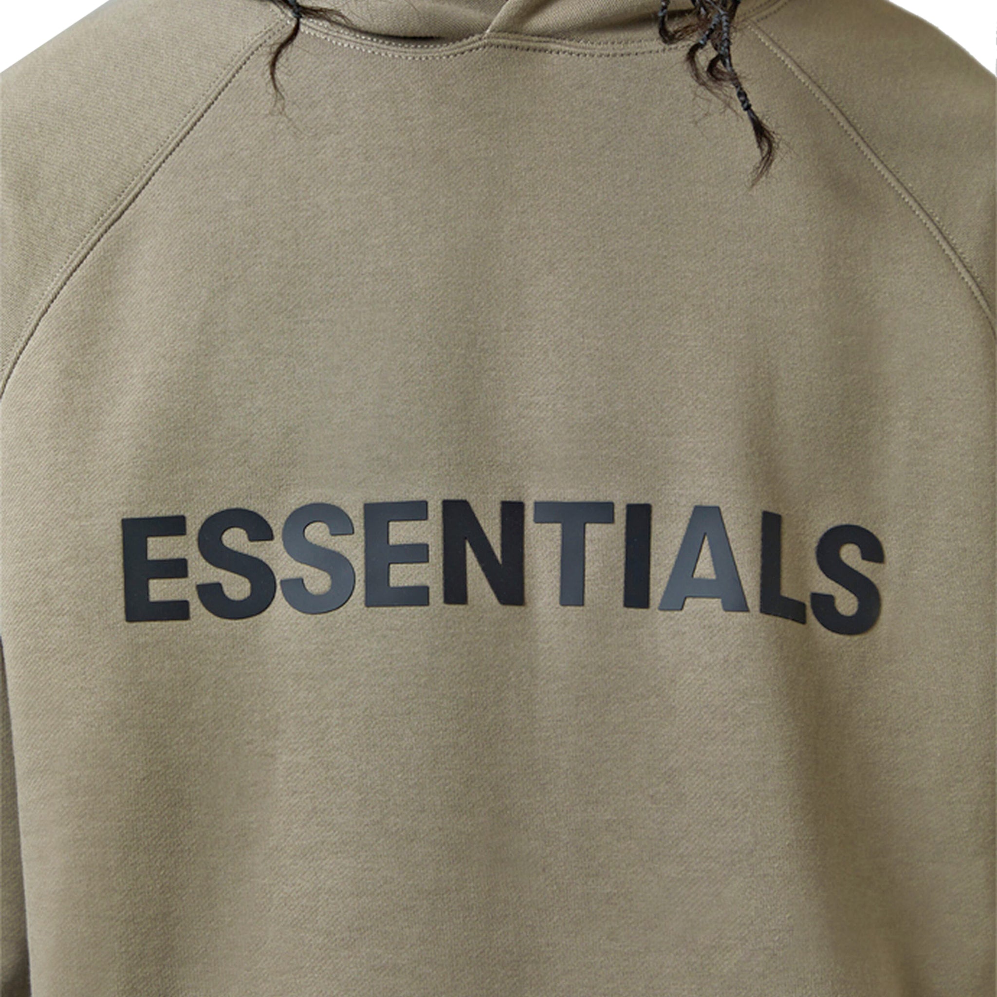 Model chest view of Fear Of God Essentials Taupe Hoodie