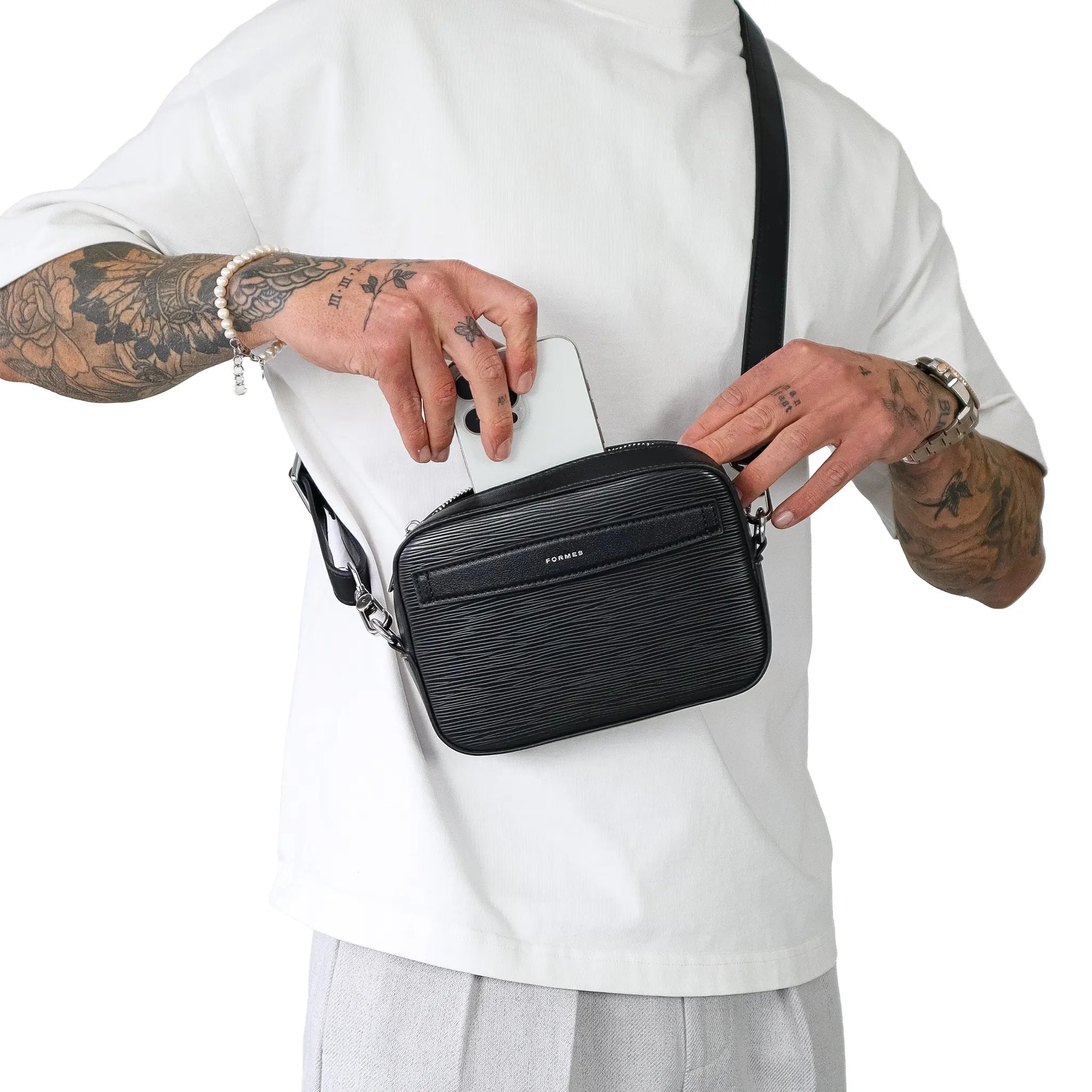 Front View of Formes Adapt Ripple Nero Mini Crossbody Bag