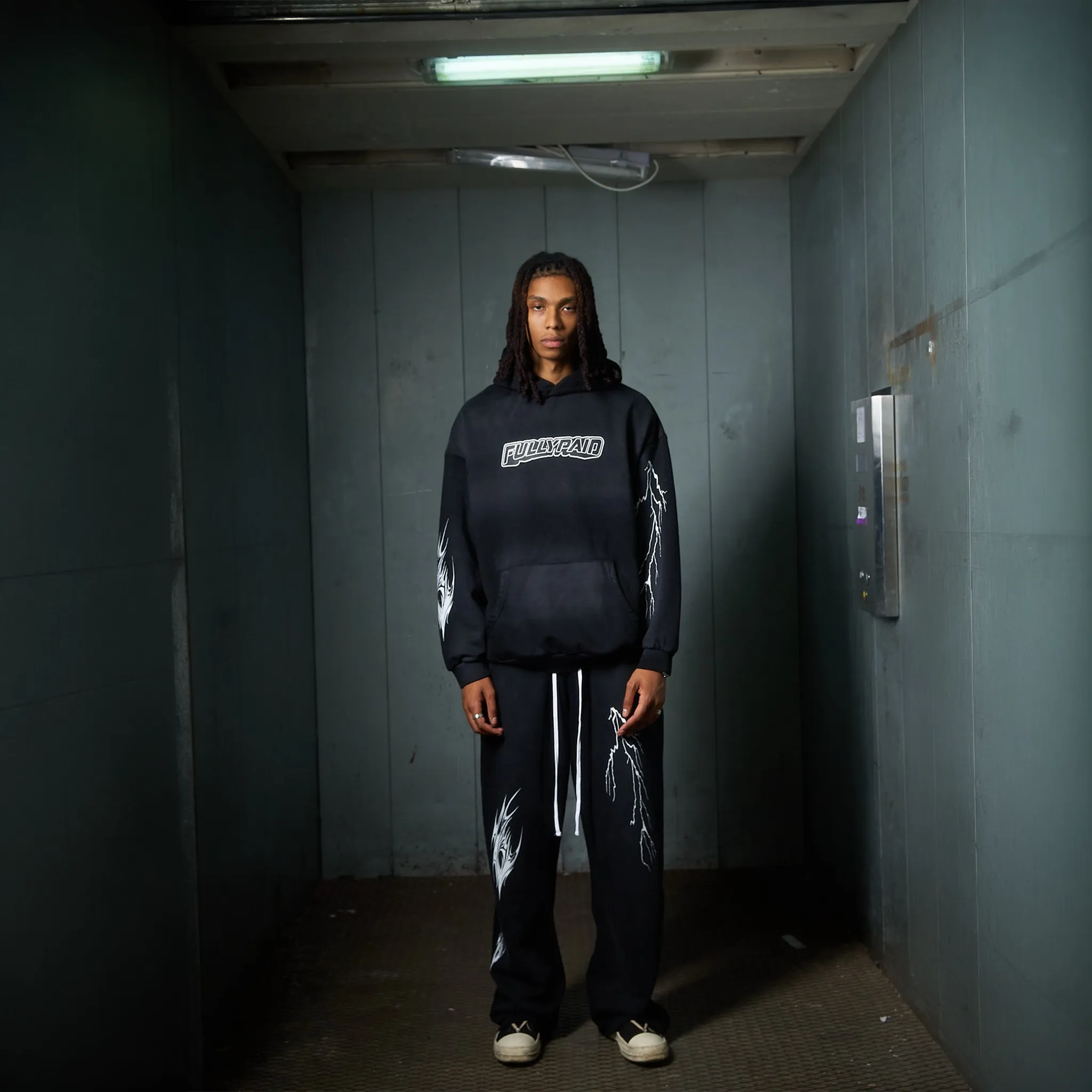 Model View of Fully Paid World Acid Wash Black Hoodie