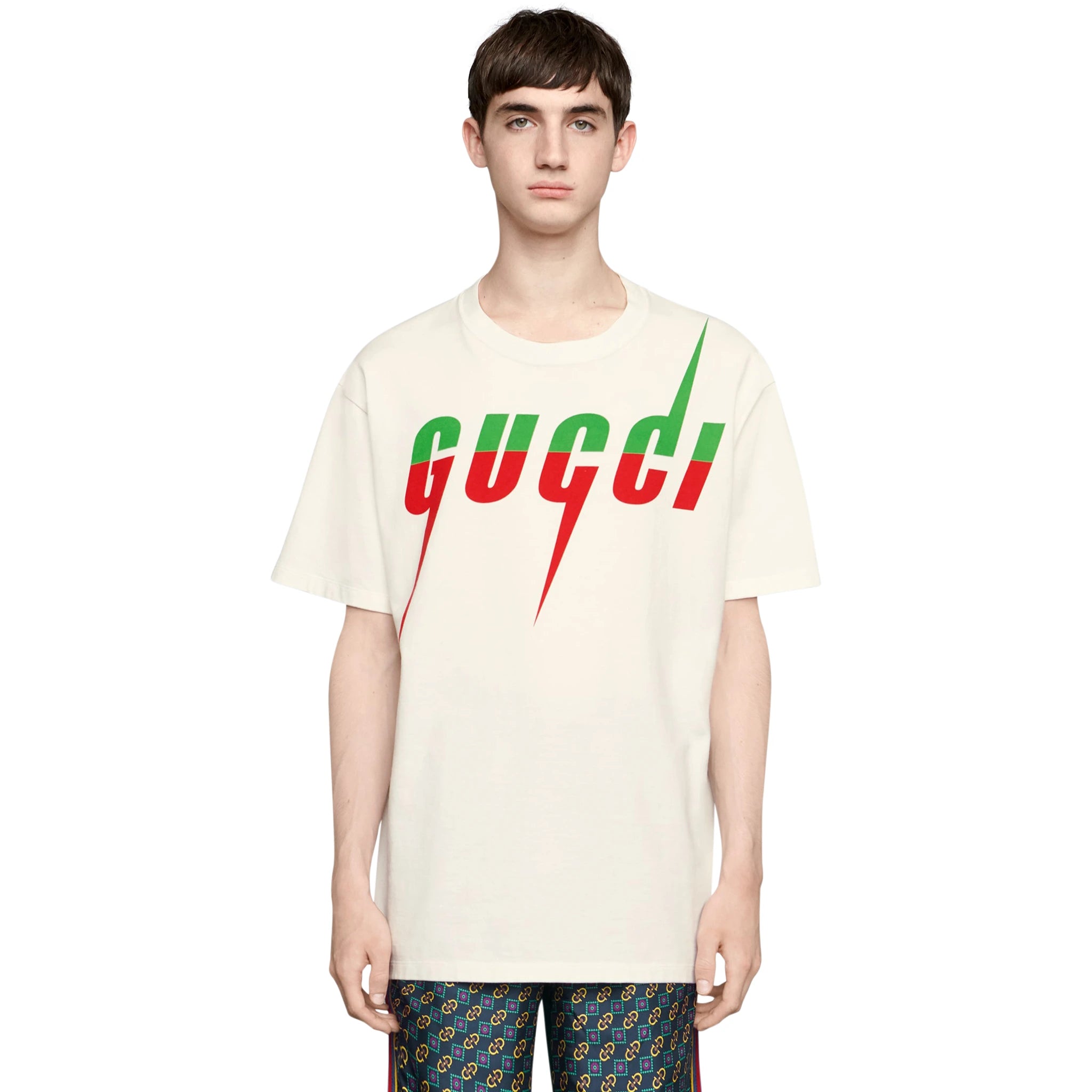 Model front view of Gucci Blade Print White T Shirt 565806 XJAZY 9037