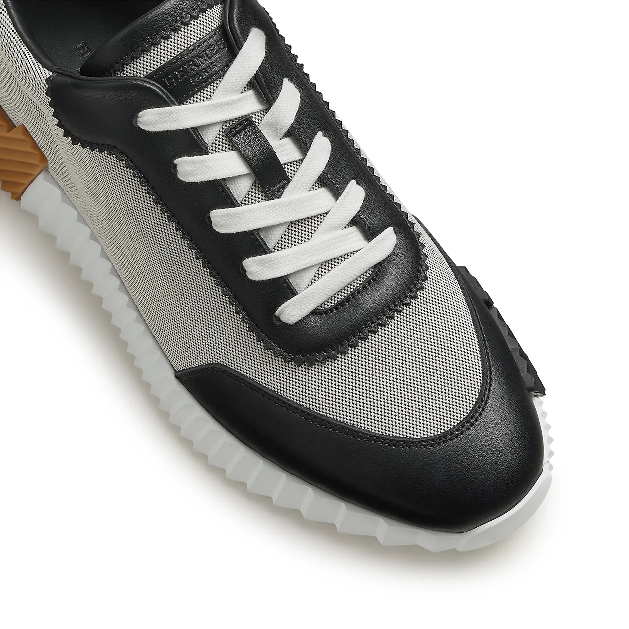 Detailed Upper View of Hermes Paris Bouncing Calf Sneaker Prunoir Noir H261898ZH01400