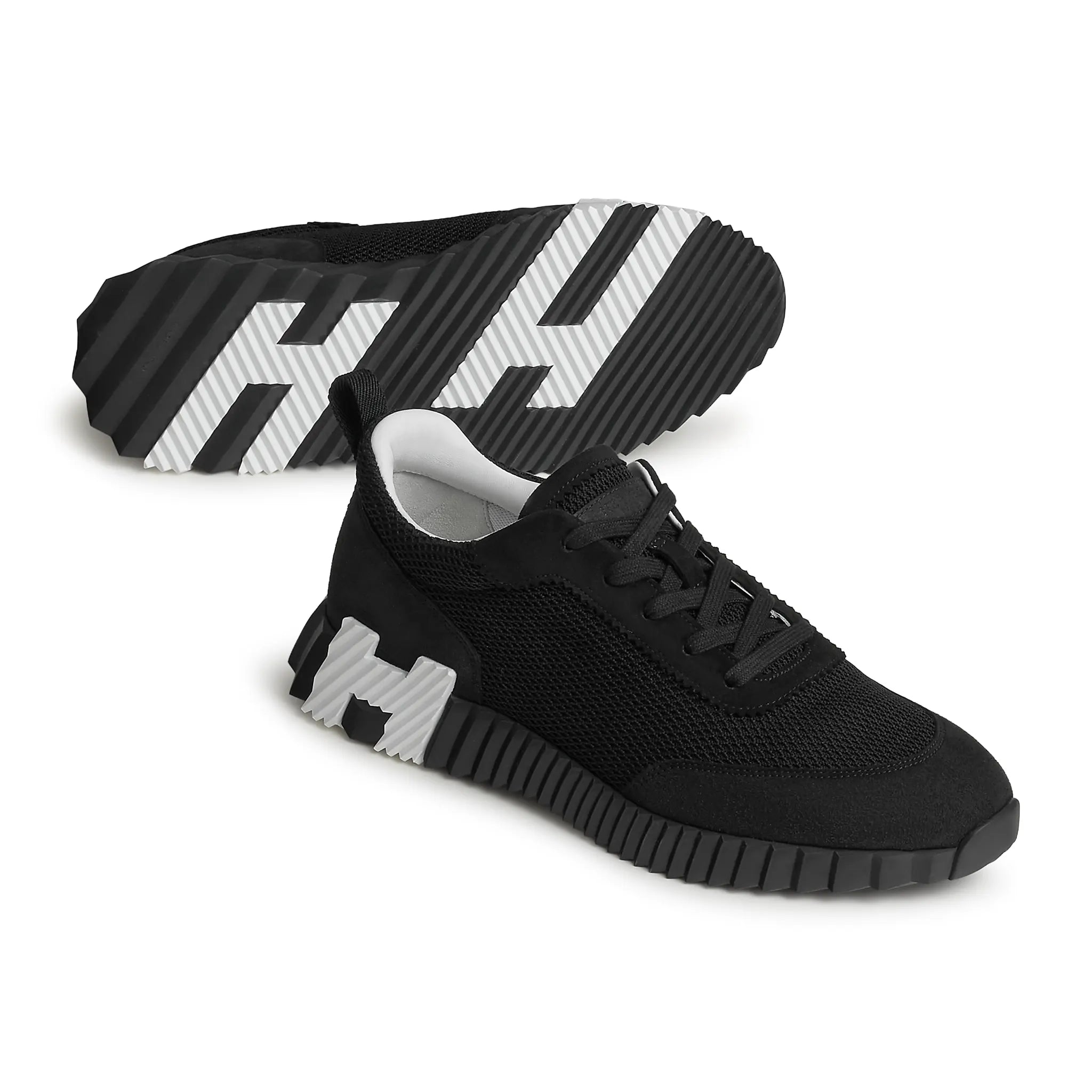 Sole Side View of Hermes Paris Bouncing Mesh Sneaker Noir H27100GZHAA400