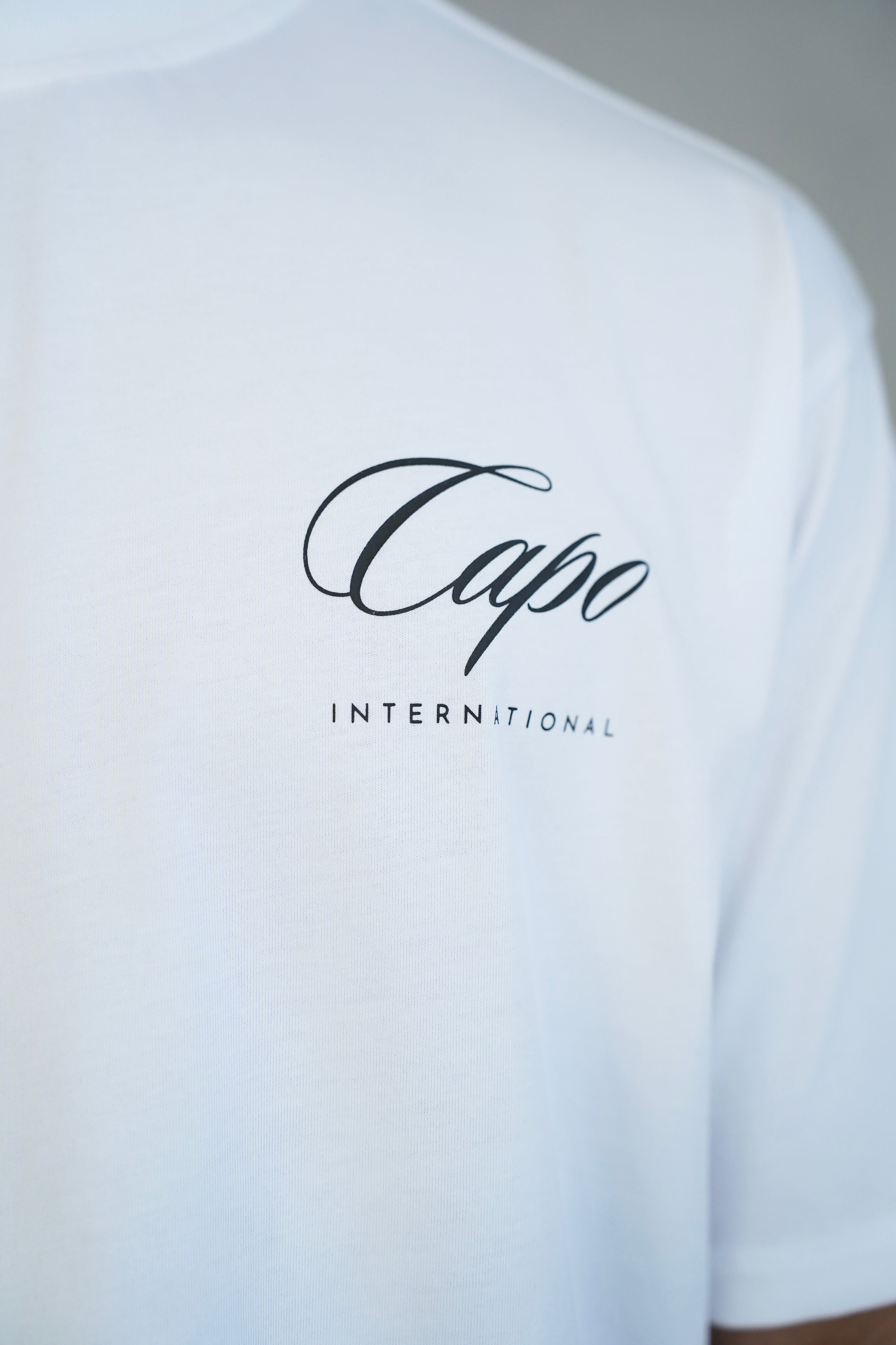 CAPO International White T-Shirt