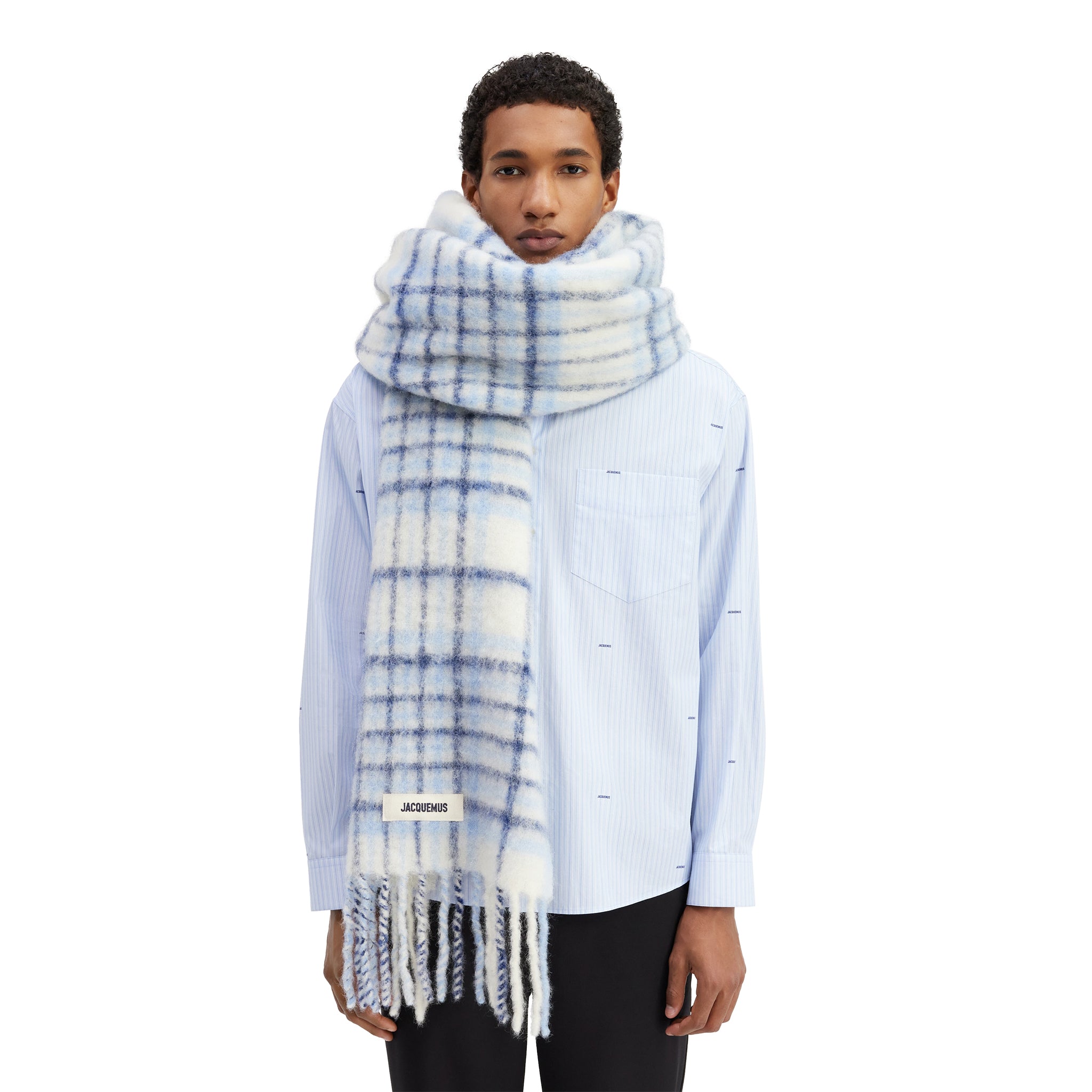 Model view of Jacquemus L'echarpe Carro Checked Blue Scarf - 236AC572-5087-3CY