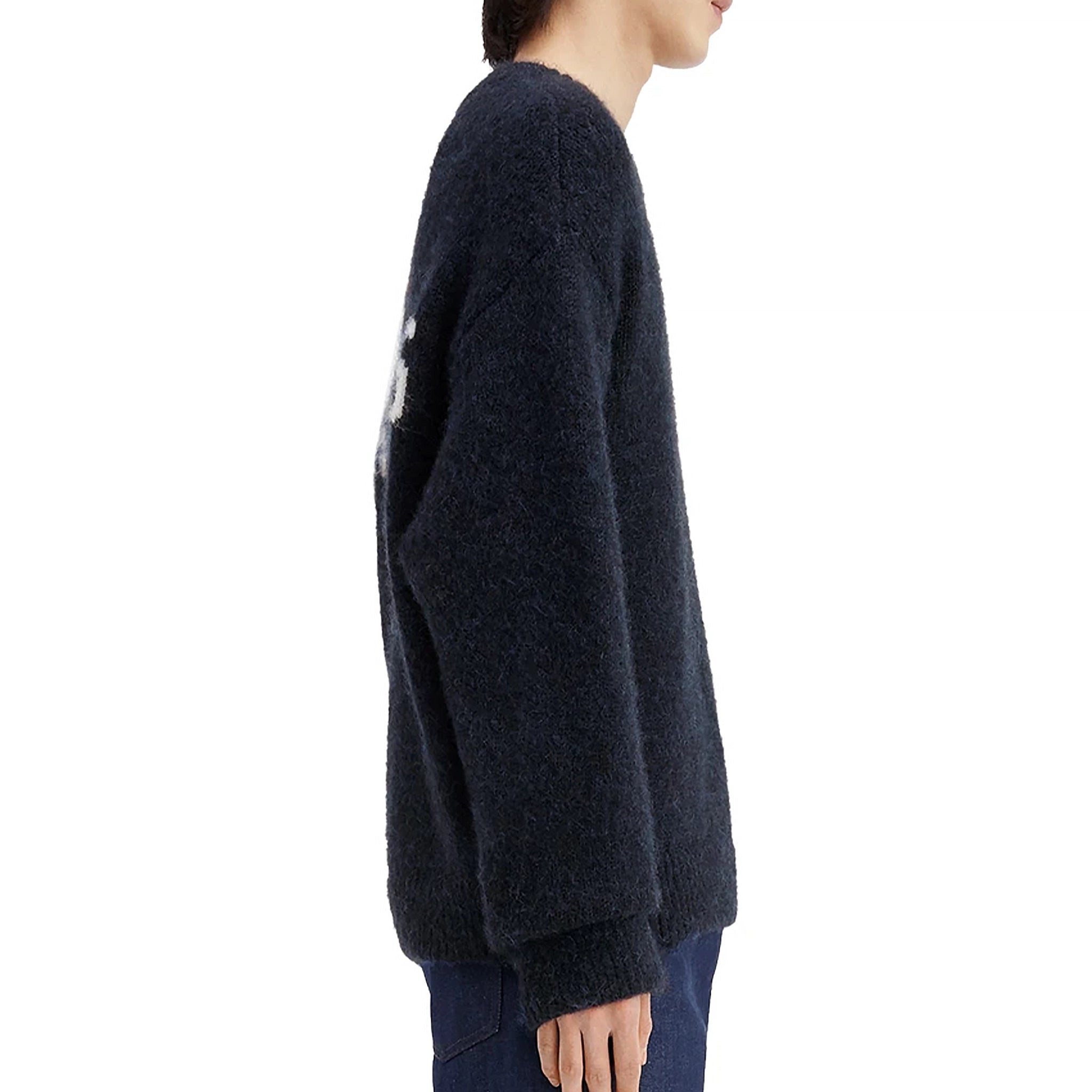 Model side view of Jacquemus La Maille Pavane Dark Navy Knit 236KN284-2329-390