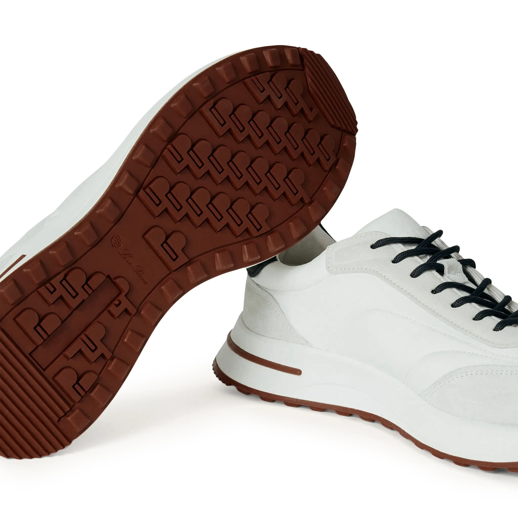 Sole Side View of Loro Piana Week End Walk White Sneaker FAP9780_1000