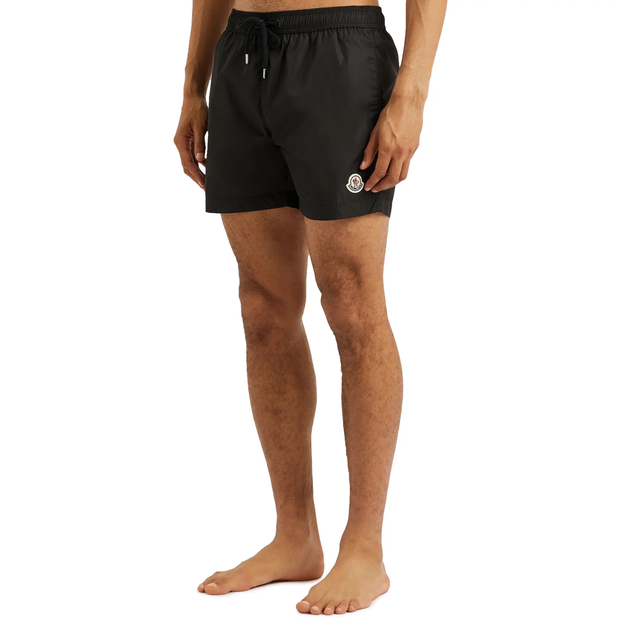 Model Front view of view of Moncler Black Swim Shorts J10912C0000453326