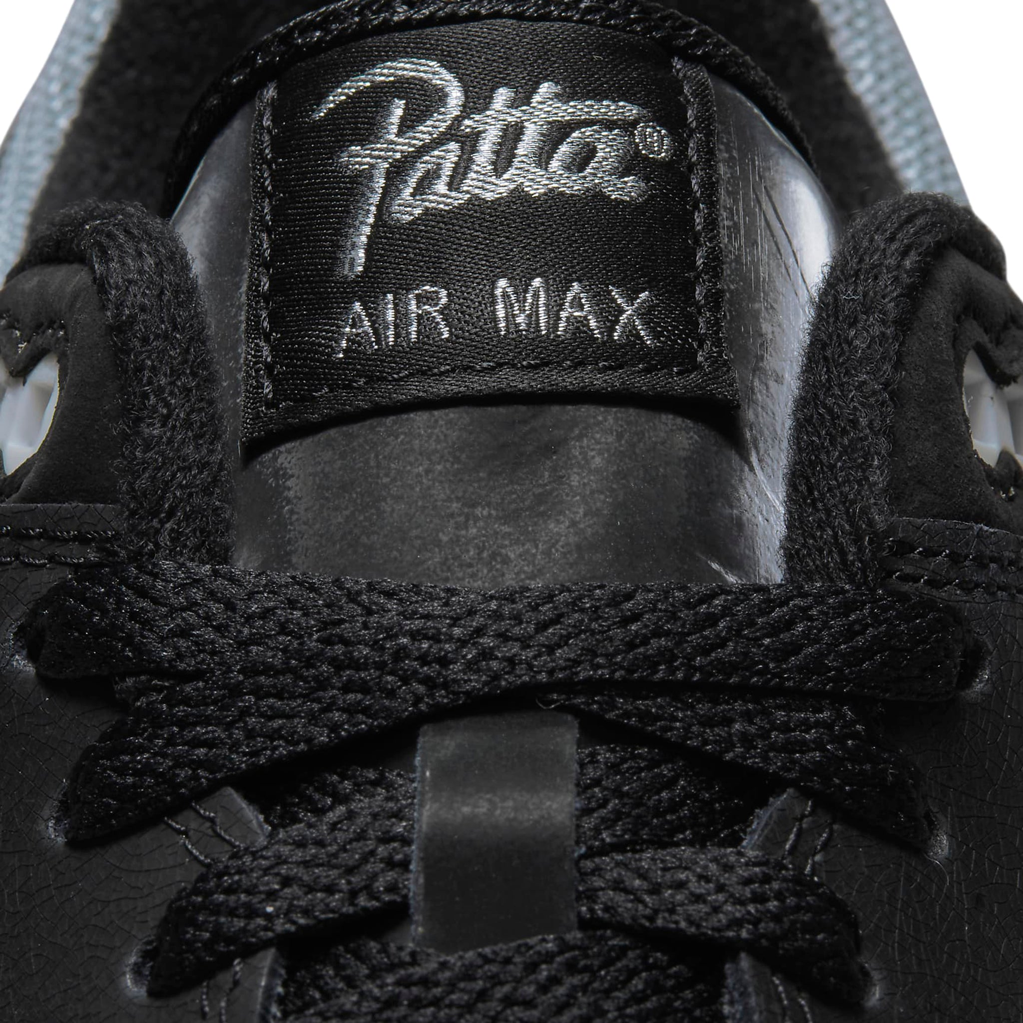 Logo view of Nike Air Max 1 Patta Waves Black (With Bracelet) DQ0299-001