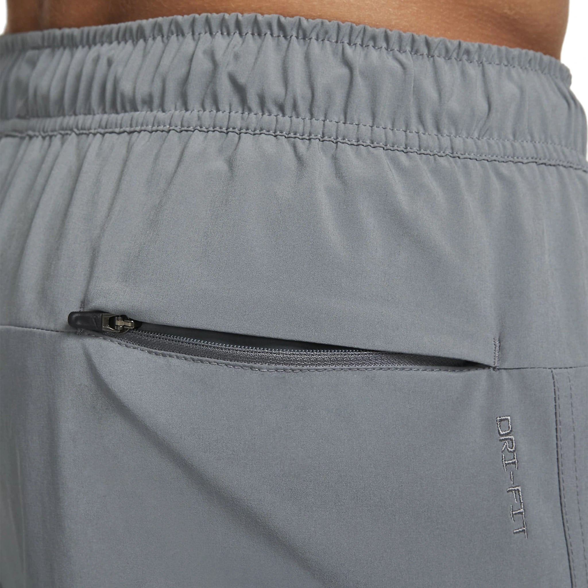 model back pocket view of Nike Challenger 9-Inch Grey Shorts DV9331-084