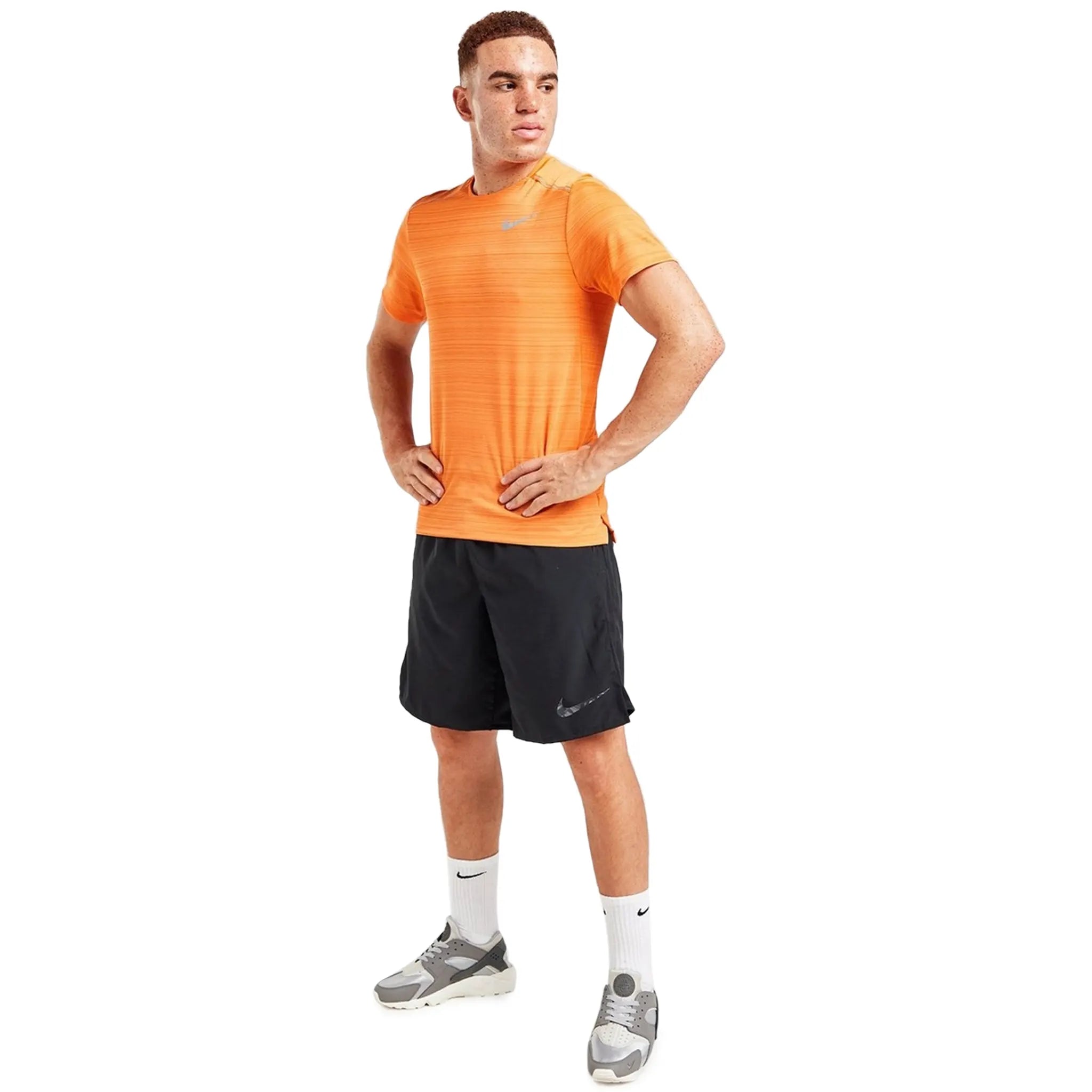 Model view of Nike Dri-FIT 1.0 Orange Miler Running T Shirt AJ7565-871