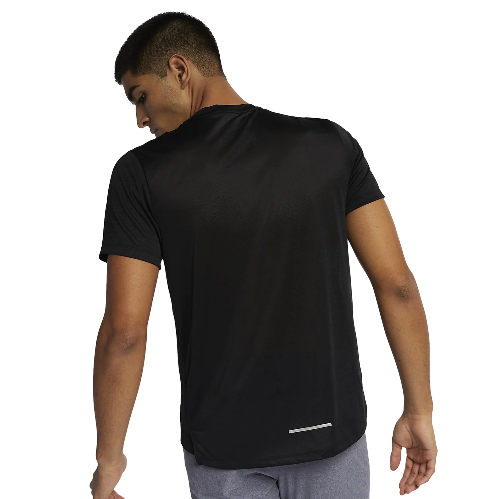 Model back view of Nike Dri-FIT Black Miler Running T Shirt AJ7566-010