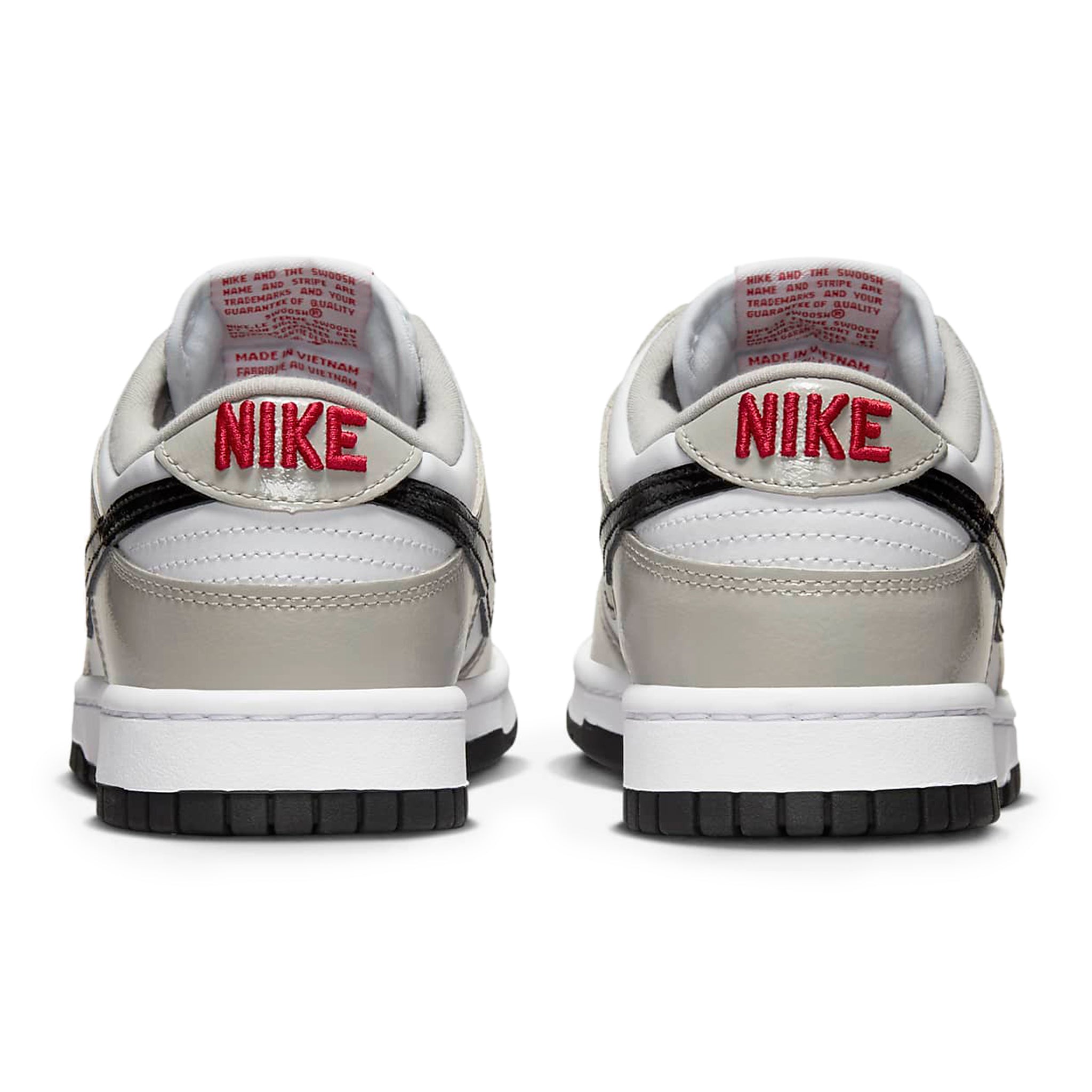 Heel view of Nike Dunk Low ESS Light Iron Ore (W) DQ7576-001
