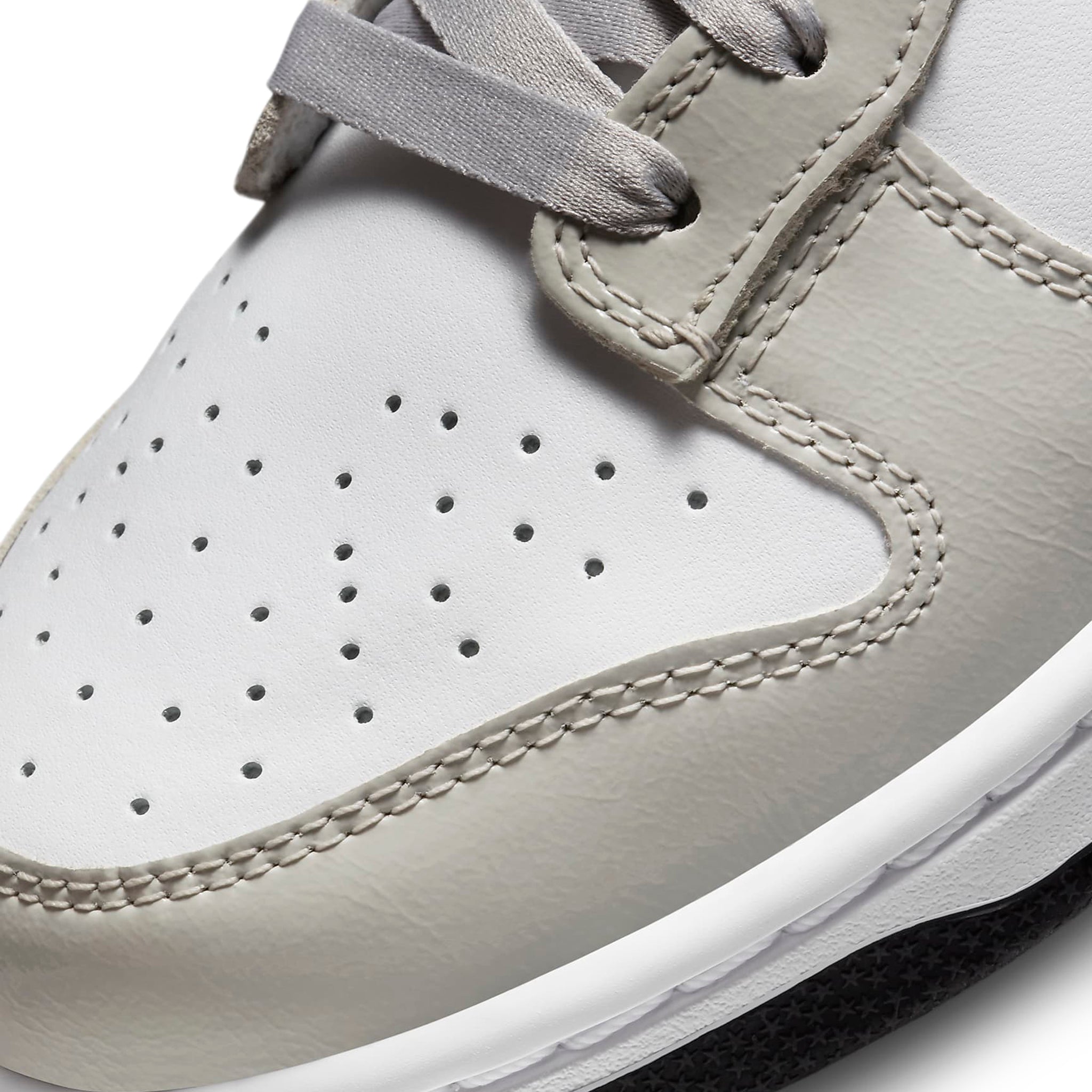 Toe box view of Nike Dunk Low ESS Light Iron Ore (W) DQ7576-001
