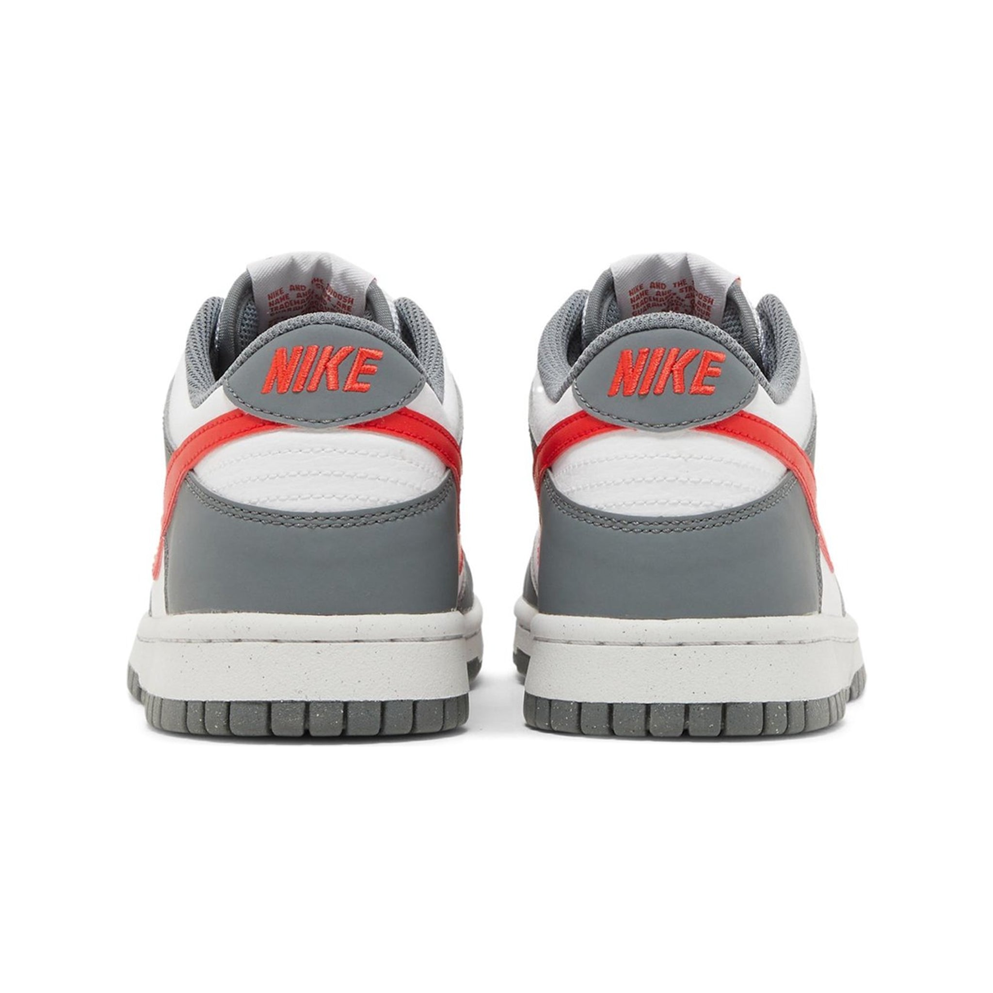 Heel view of Nike Dunk Low Next Nature Smoke Grey Light Crimson (GS) FB8038-001