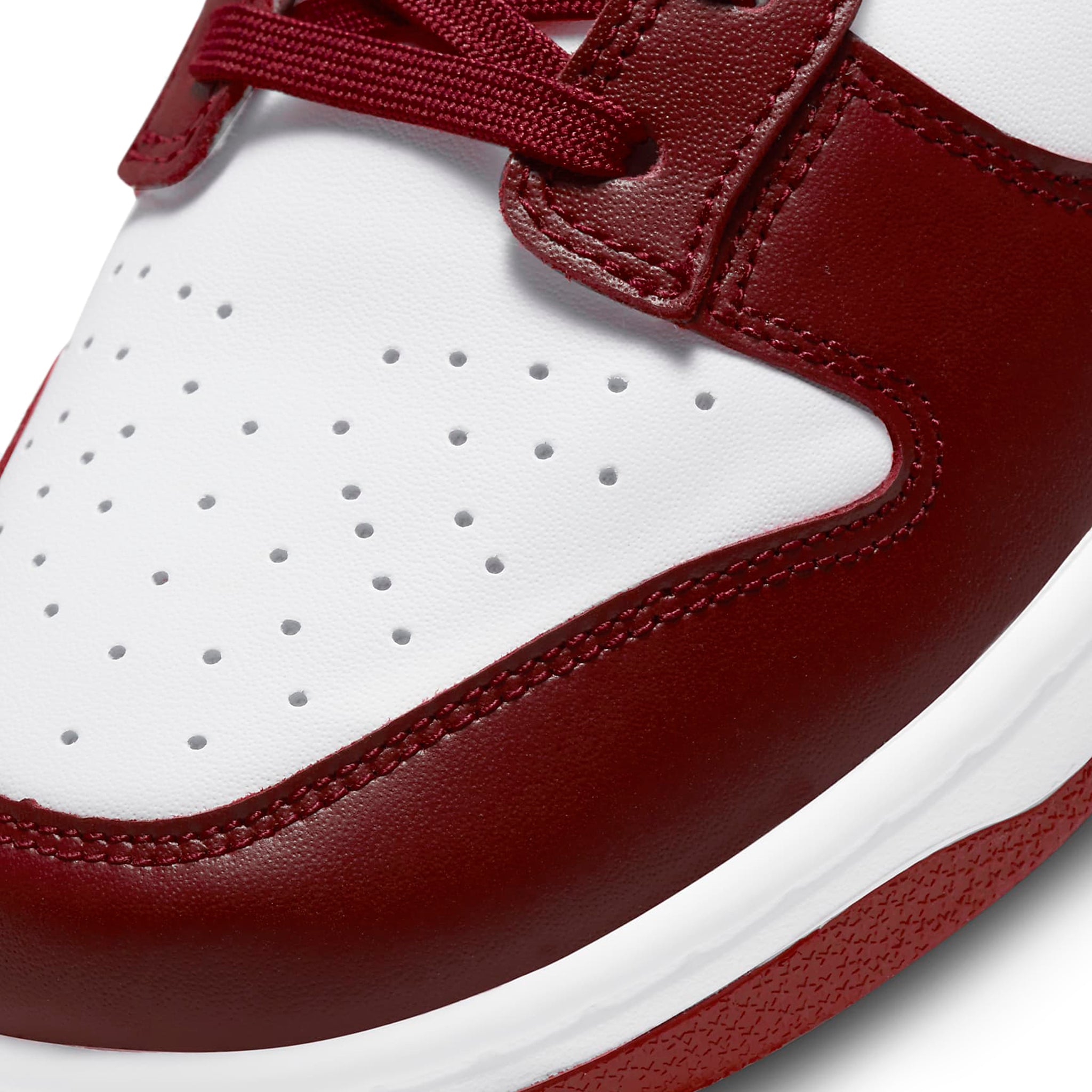 Toe box view of Nike Dunk Low Team Red D1391-601