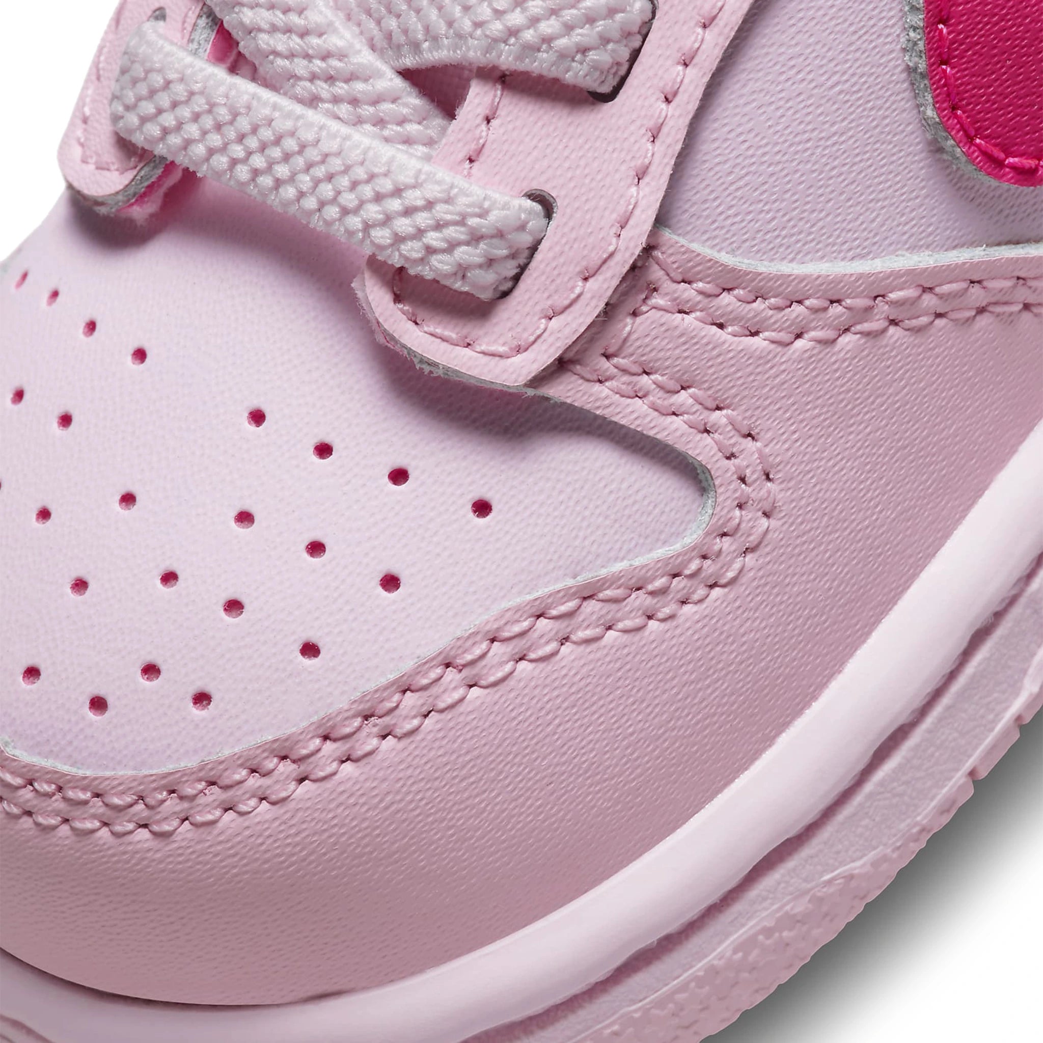 Toe box view of Nike Dunk Low Triple Pink (TD) DH9761-600