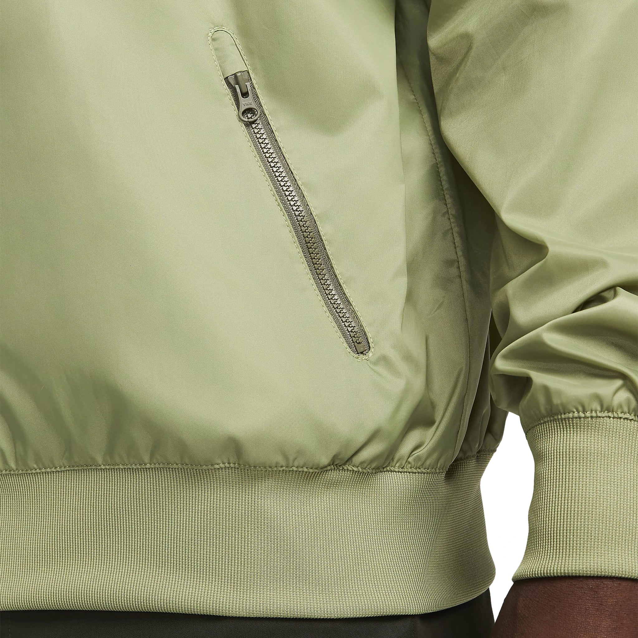 Zip detail view of Nike Sportswear Windrunner Green Jacket