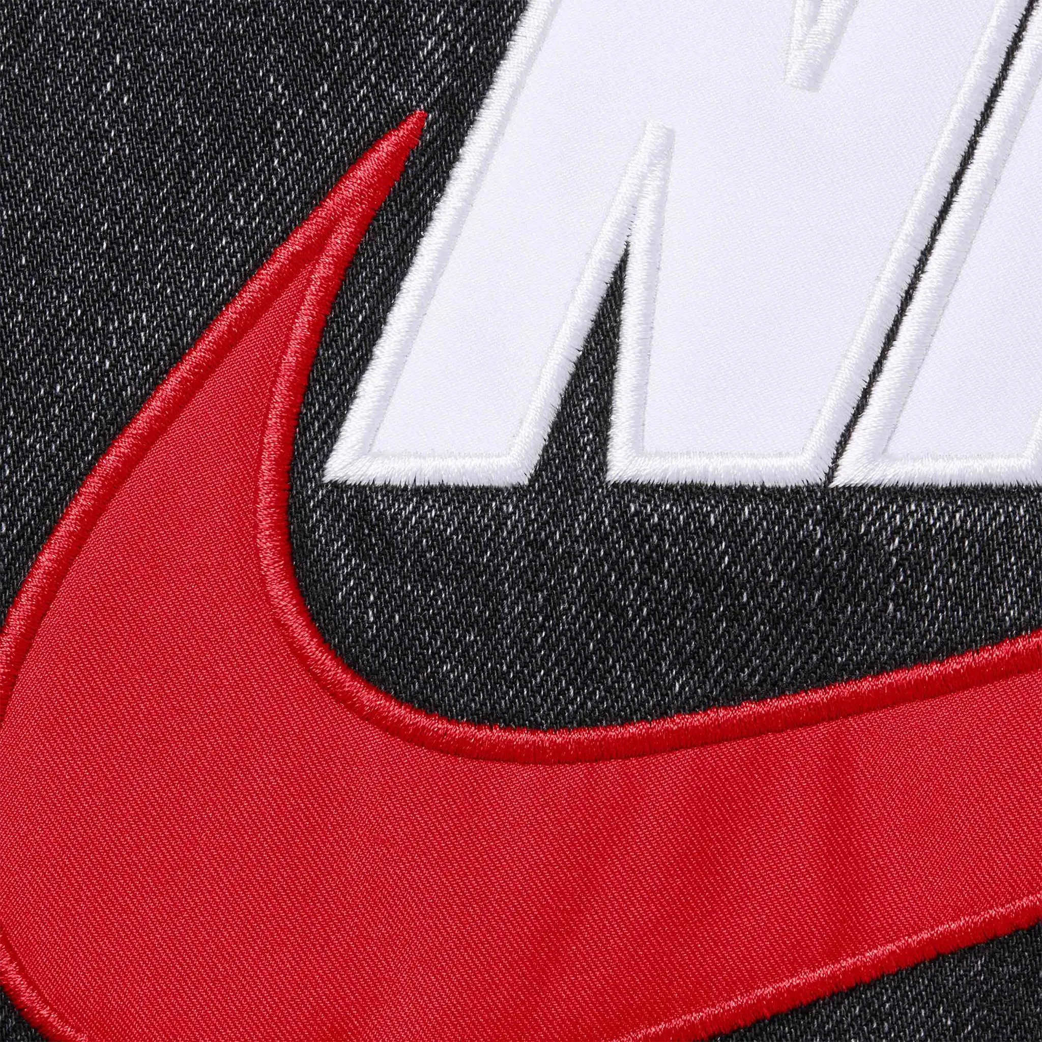 Detail view of Nike Supreme Denim Puffer Vest Black