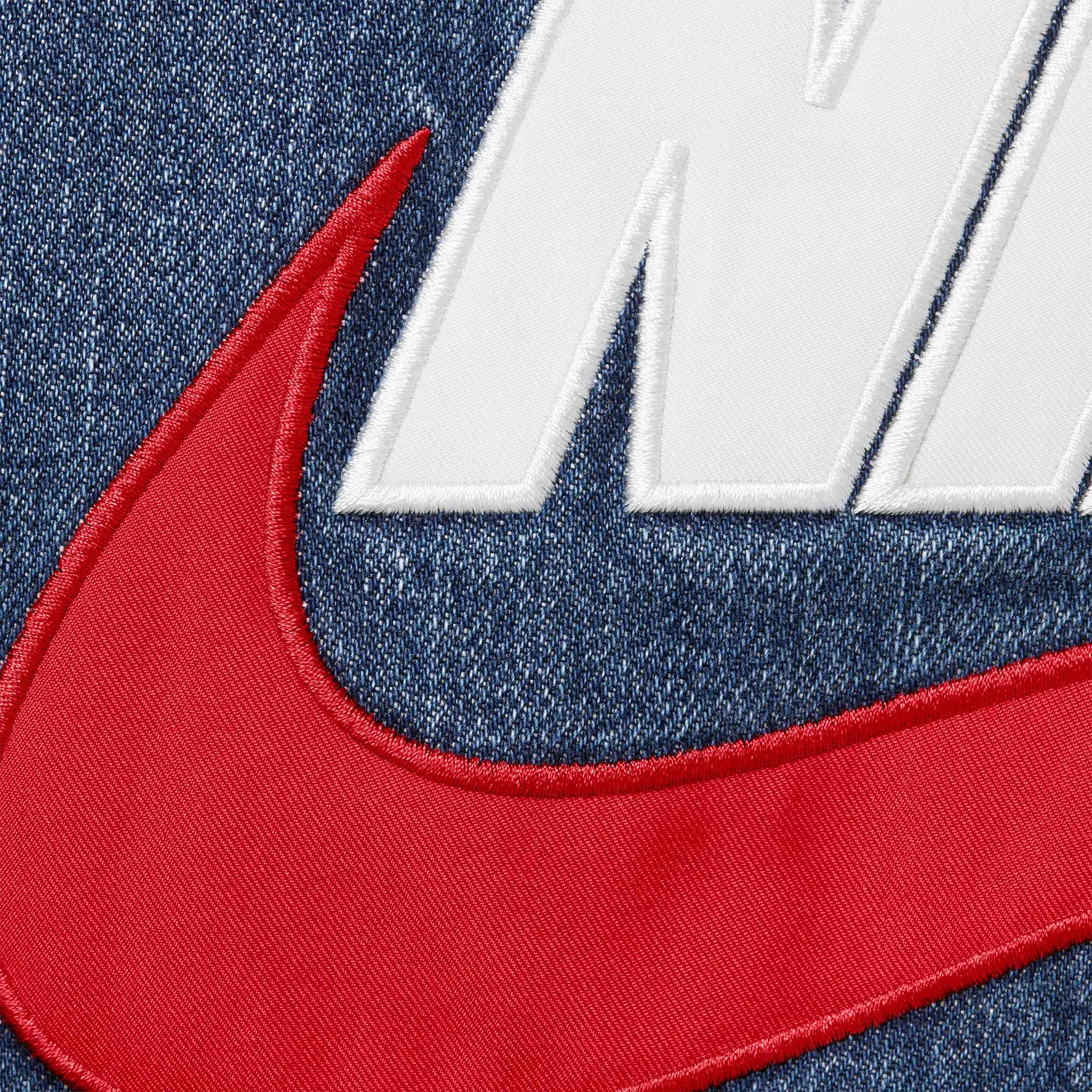 Detail view of Nike Supreme Denim Puffer Vest Indigo Blue