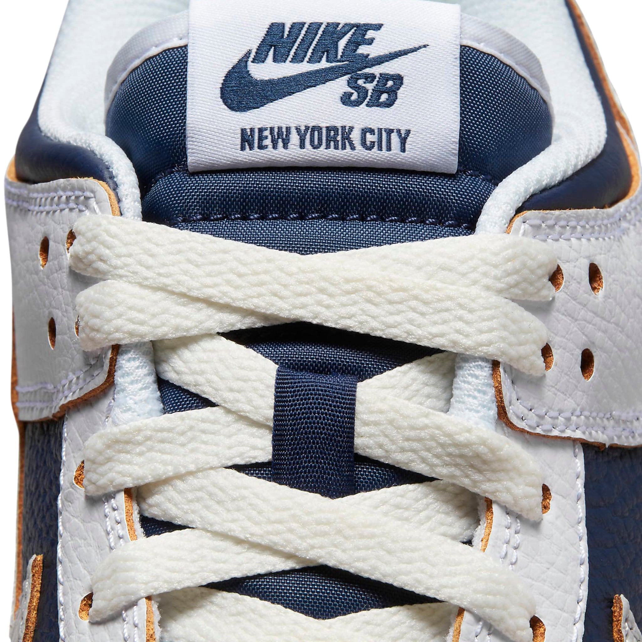 Laces view of Nike x HUF SB Dunk Low New York City FD8775-100