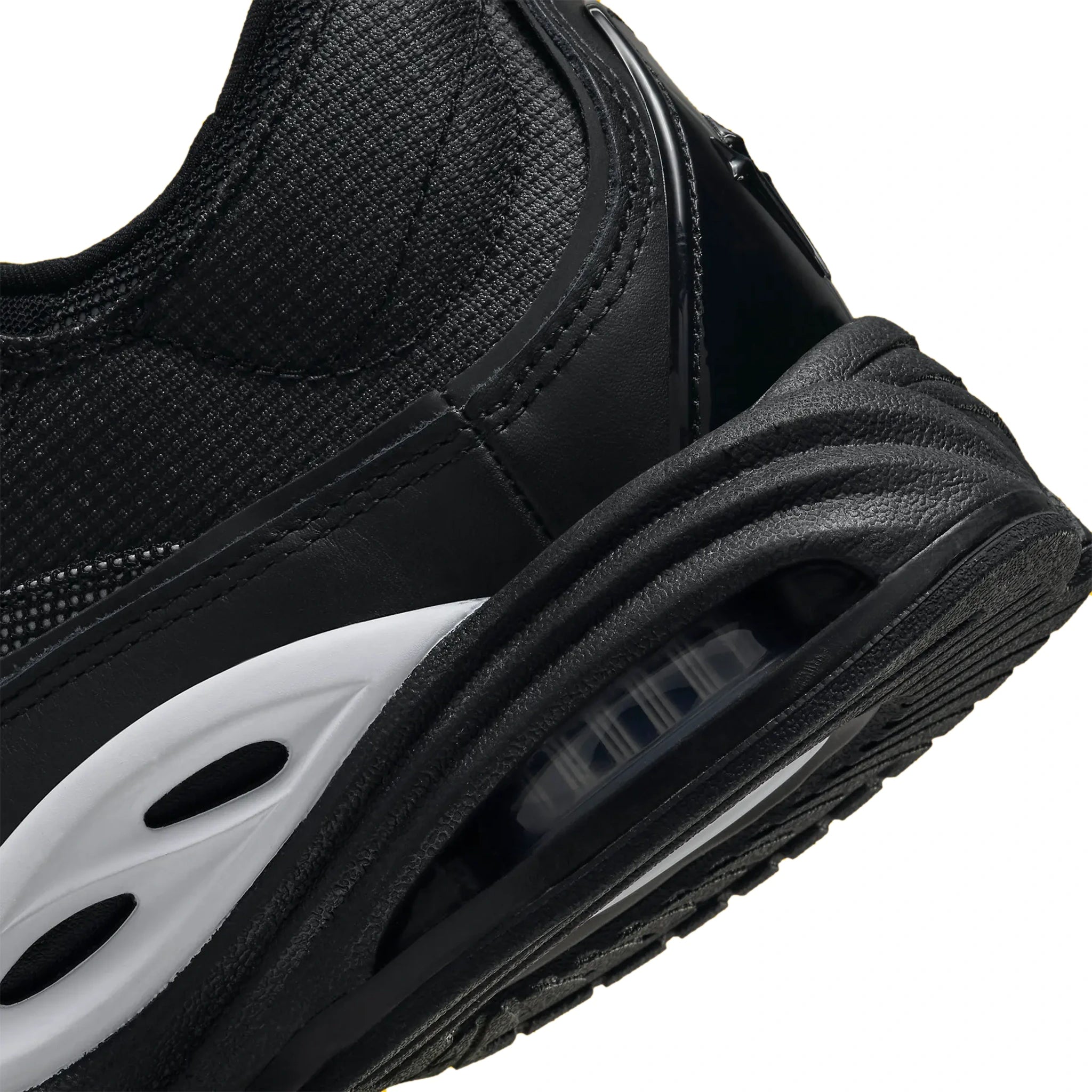 Heel details view of Nike x NOCTA Air Zoom Drive Black White