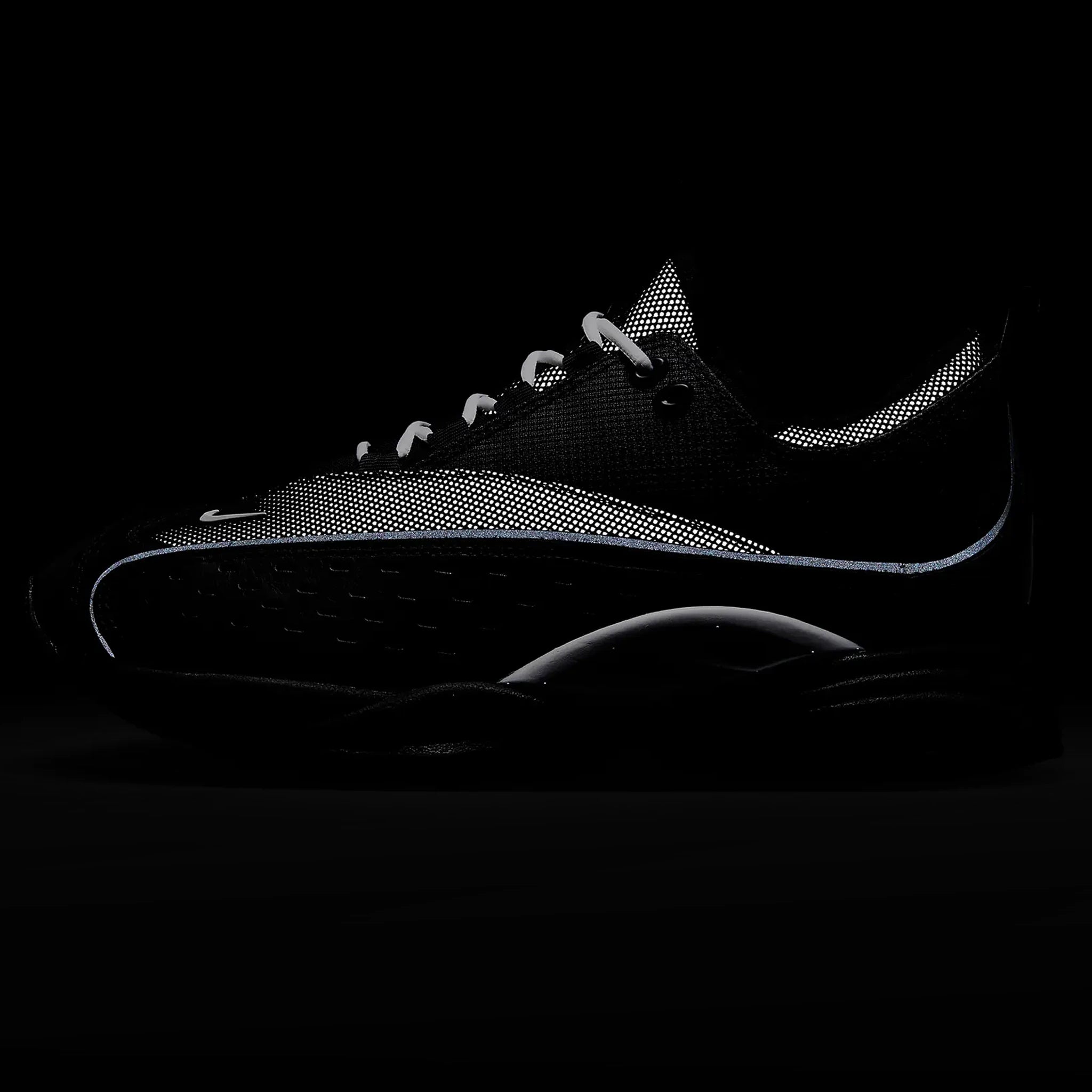 Reflective view of Nike x NOCTA Air Zoom Drive Black White