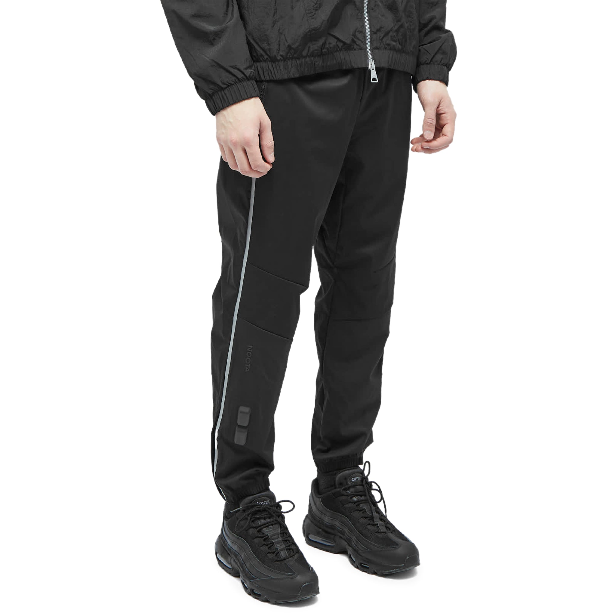 Model front view of Nike x Nocta NRG Warmup Black Pants DV3732-010