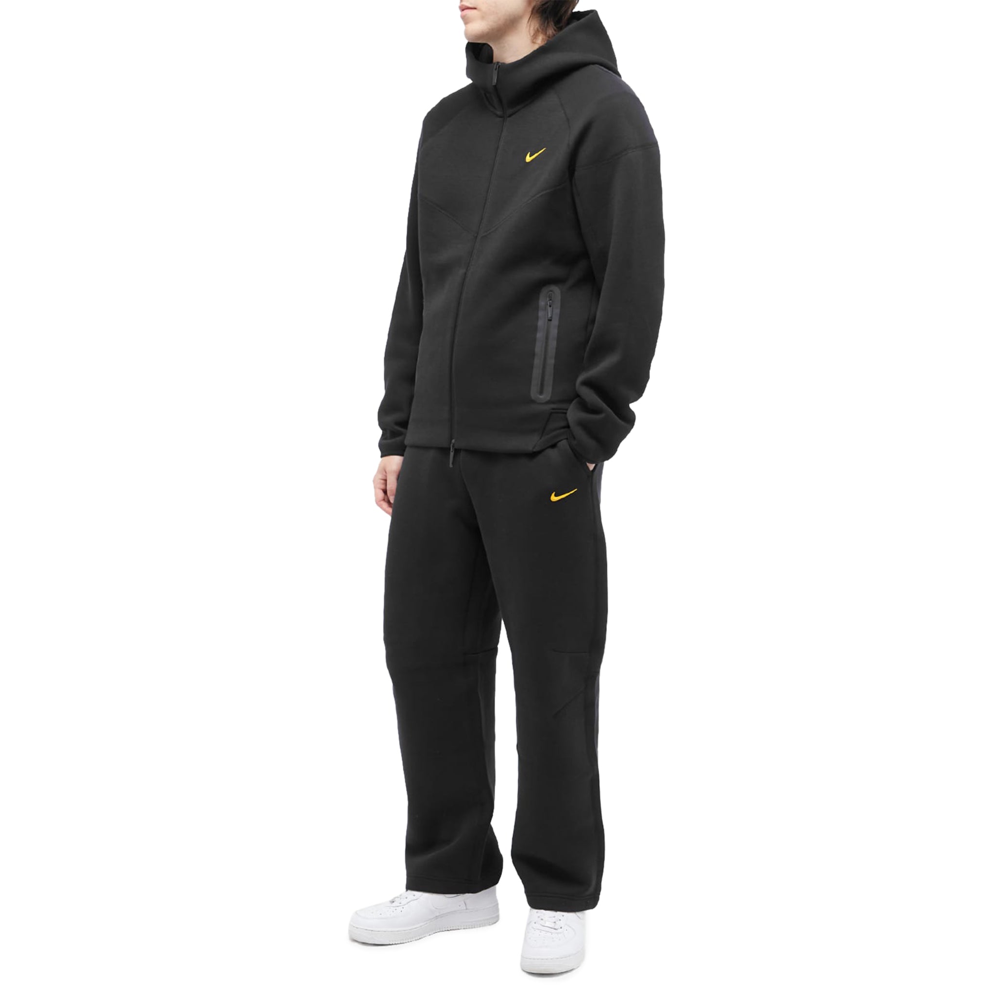 Model full view of Nike x nocta tech fleece black sweatpants FD8460-010