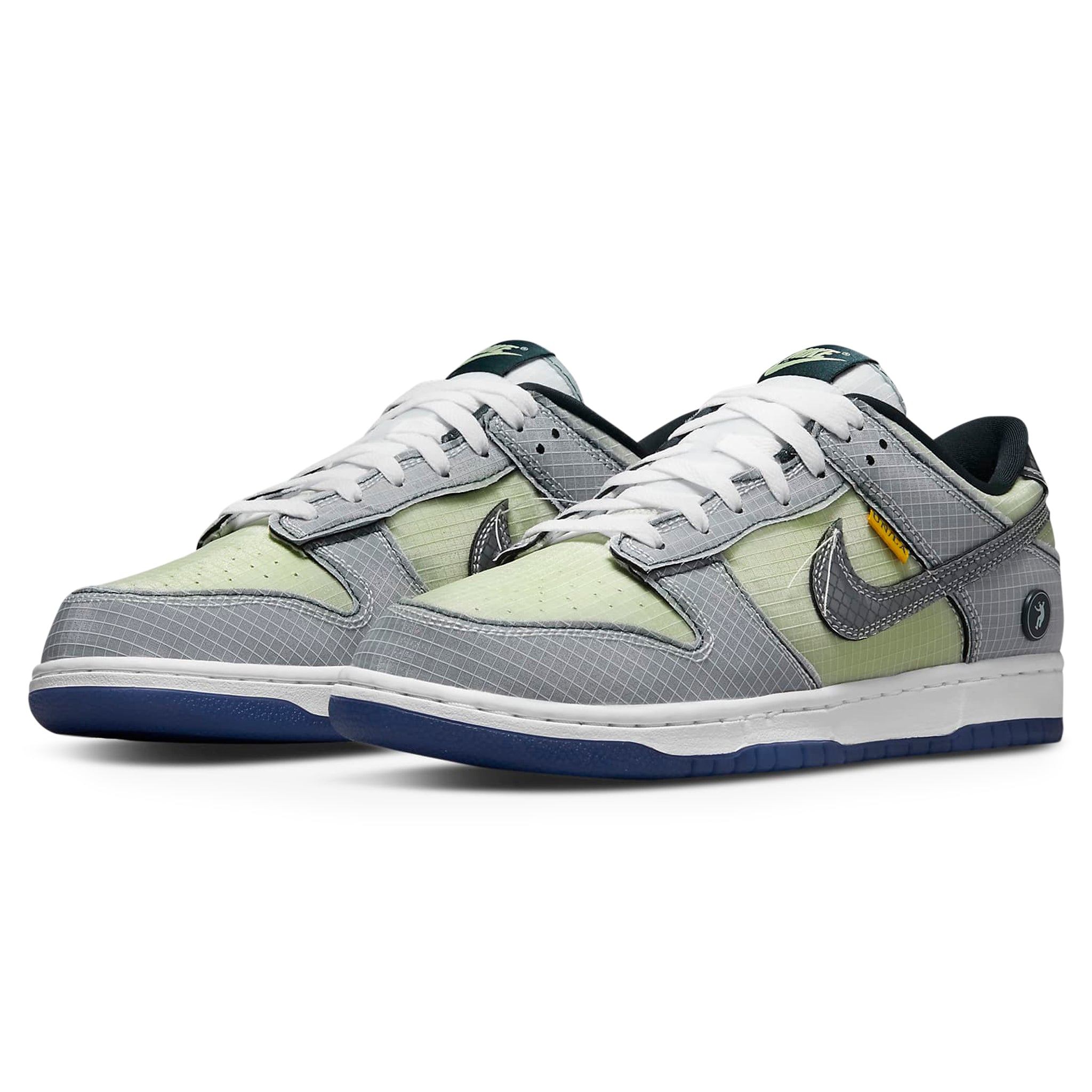 Front side view of Nike x Union Dunk Low Passport Pack Pistachio DJ9649-401