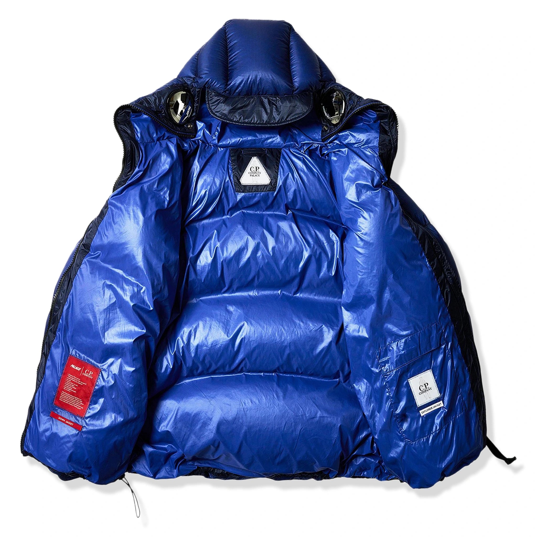 Open view of Palace x C.P. Company Bright Cobalt Puffer Jacket OW003A006099A867