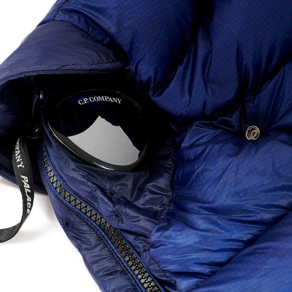 Detail goggle view of Palace x C.P. Company Bright Cobalt Puffer Jacket OW003A006099A867