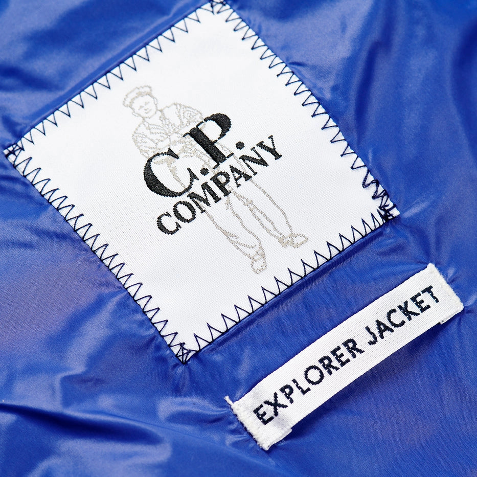 Logo view of Palace x C.P. Company Bright Cobalt Puffer Jacket OW003A006099A867