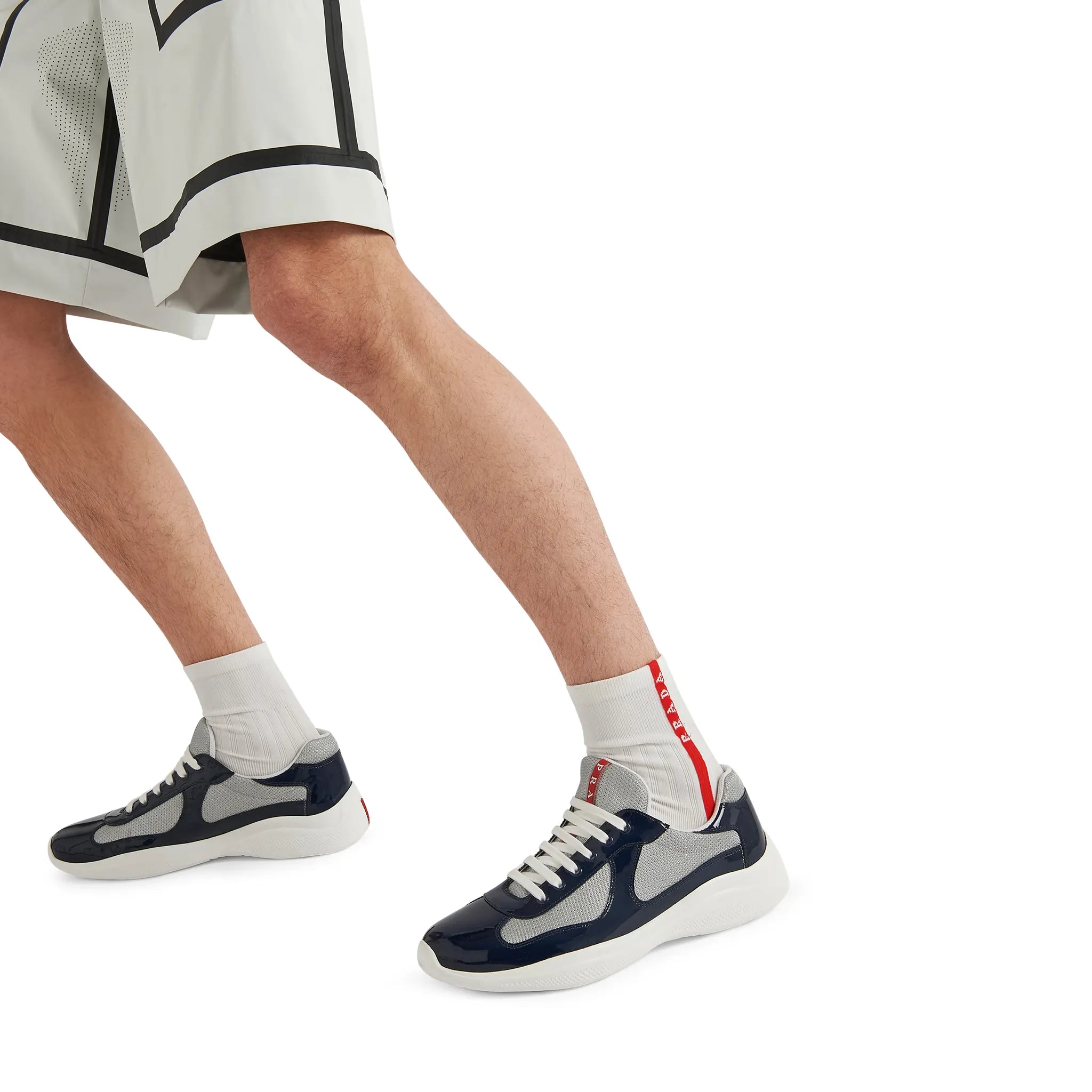 Model side view of Prada Americas Cup Royal Blue Silver Sneaker 4E3400_ASZ_F0FJT