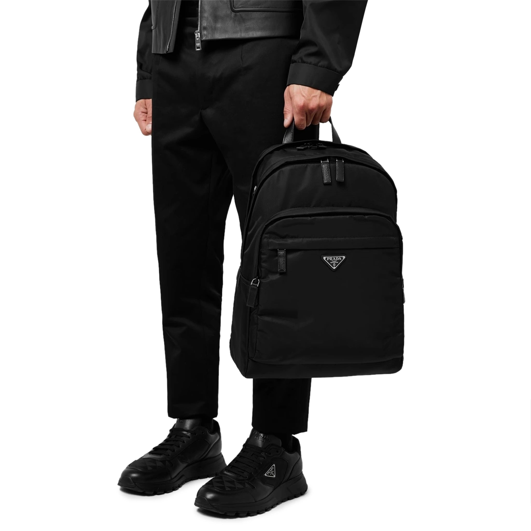 Model Front view of Prada Re-Nylon Black Backpack 2VZ048_2DMG_F0002_V_OOO