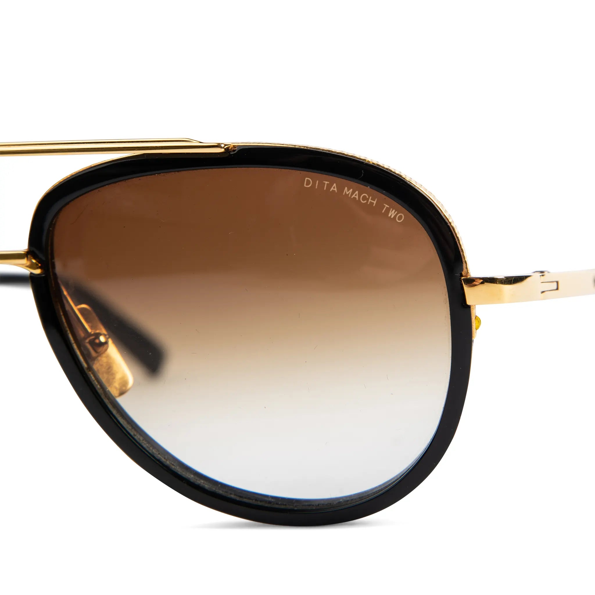 Lens logo view of Preloved - Dita Eyewear Mach Two Black Gold Sunglasses DRX-2031B-60