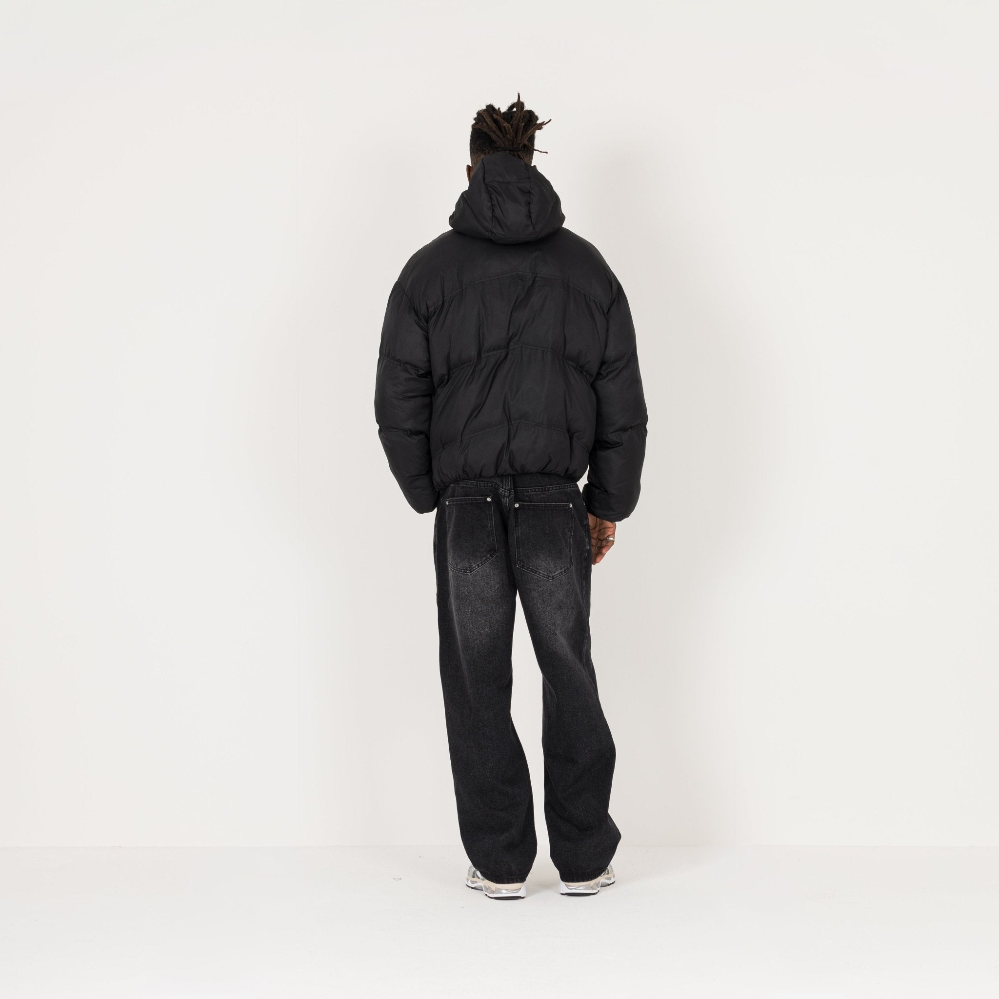Model Back view of Destructive Insulated Black Puffer Jacket