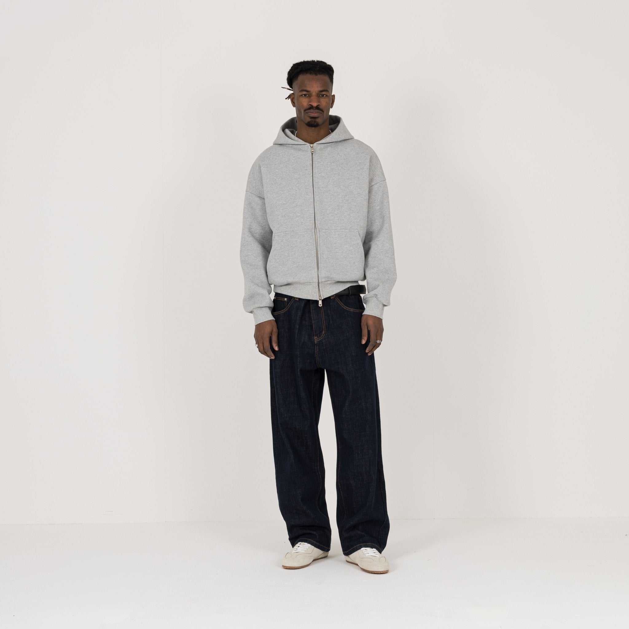 Model view of Destructive Relaxed Denim Raw Jeans