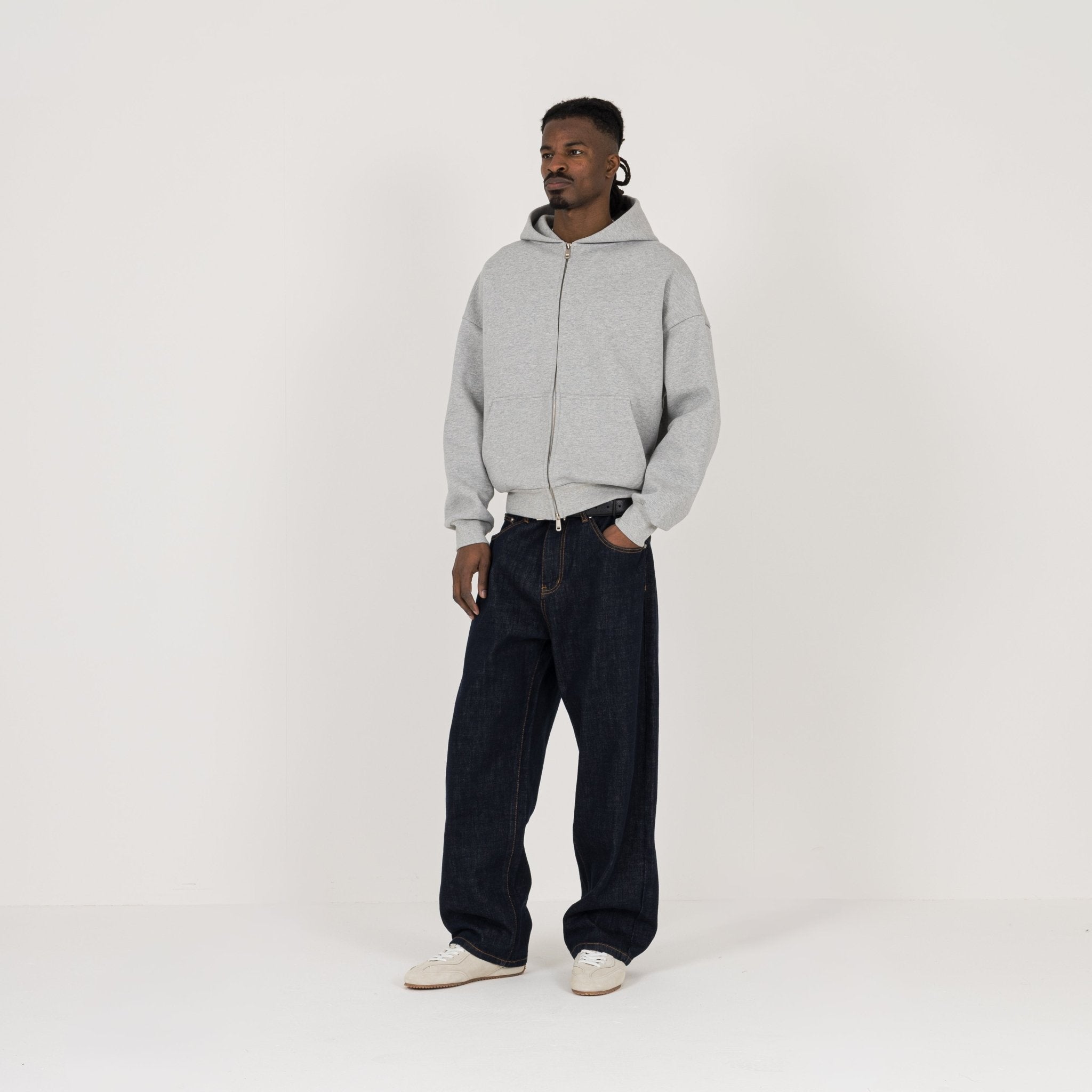 Model view of Destructive Relaxed Denim Raw Jeans