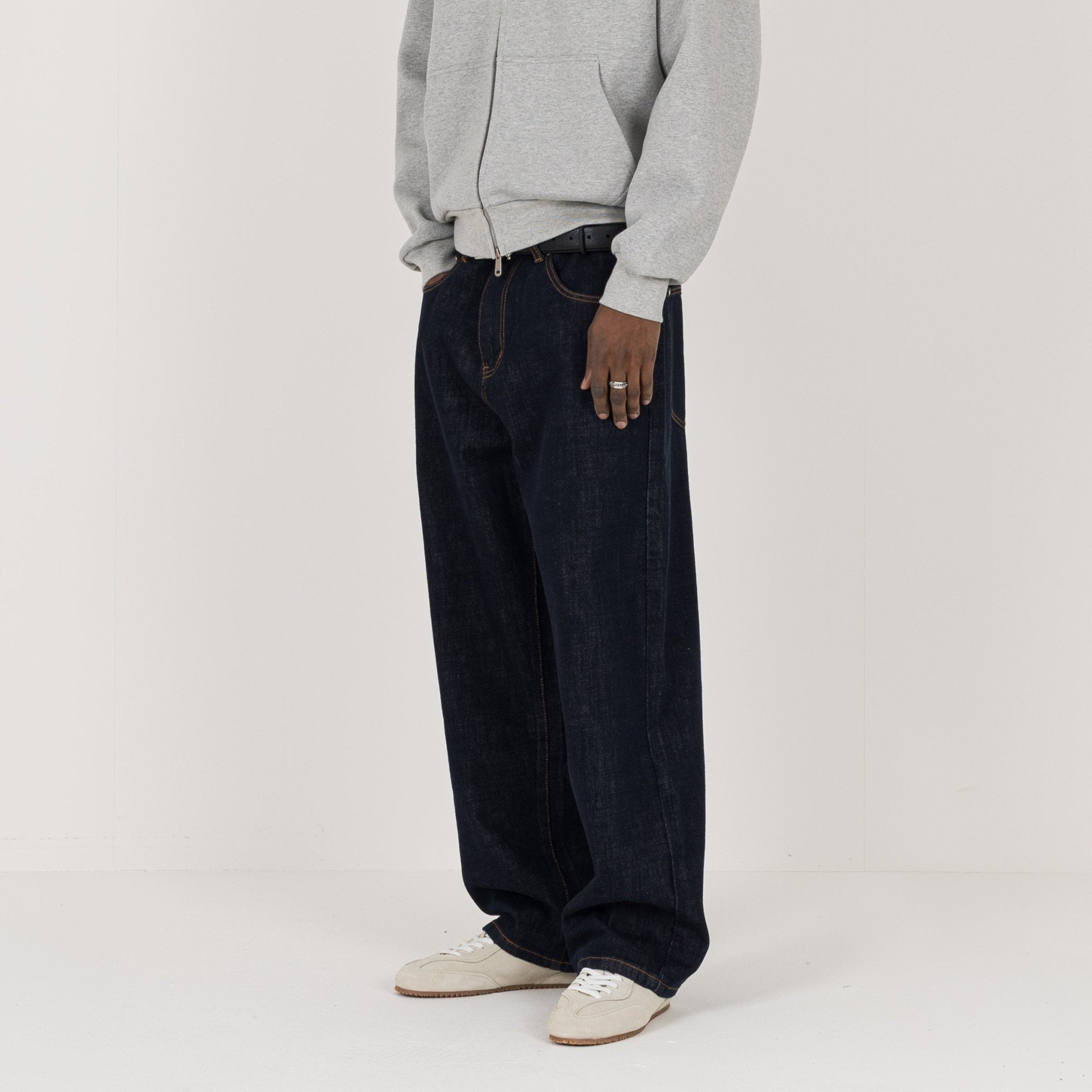 Model view of Destructive Relaxed Denim Raw Jeans