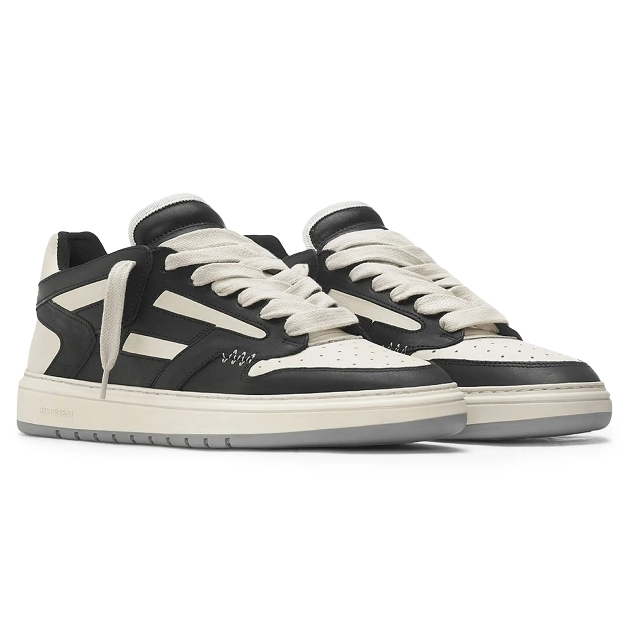 Pair view of Represent Reptor Low Black Vintage White Trainers M12043-037