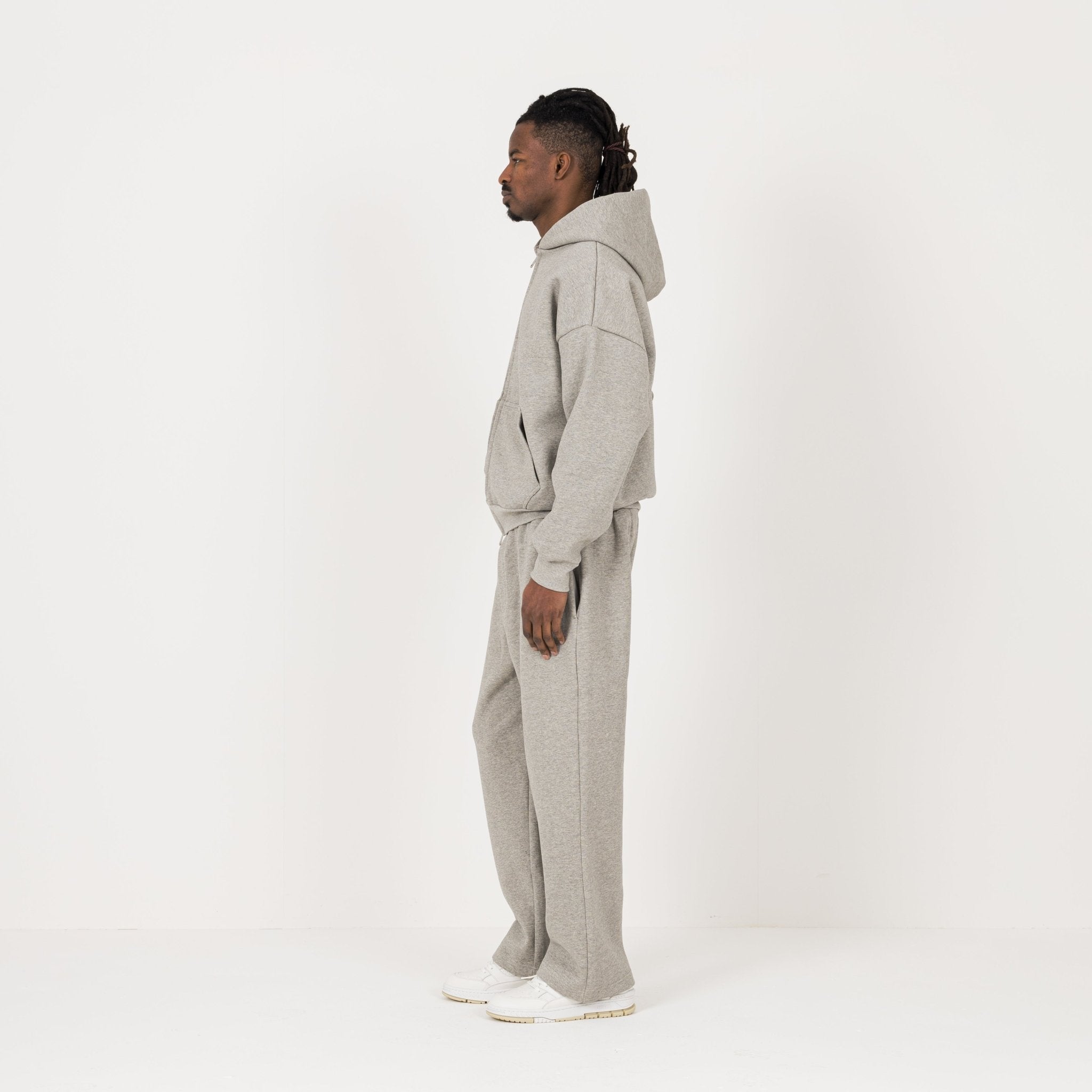 Model Side view of Destructive Sculpt Zip Stone Marl Hoodies