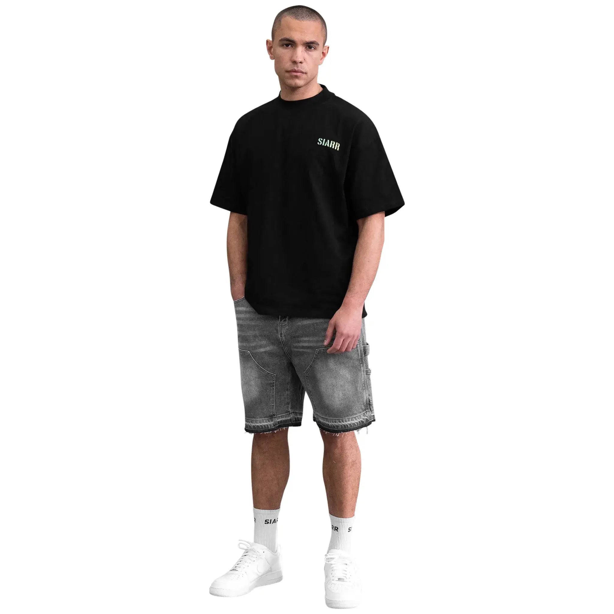 Model front view of SIARR Carpenter Shorts Dark Grey